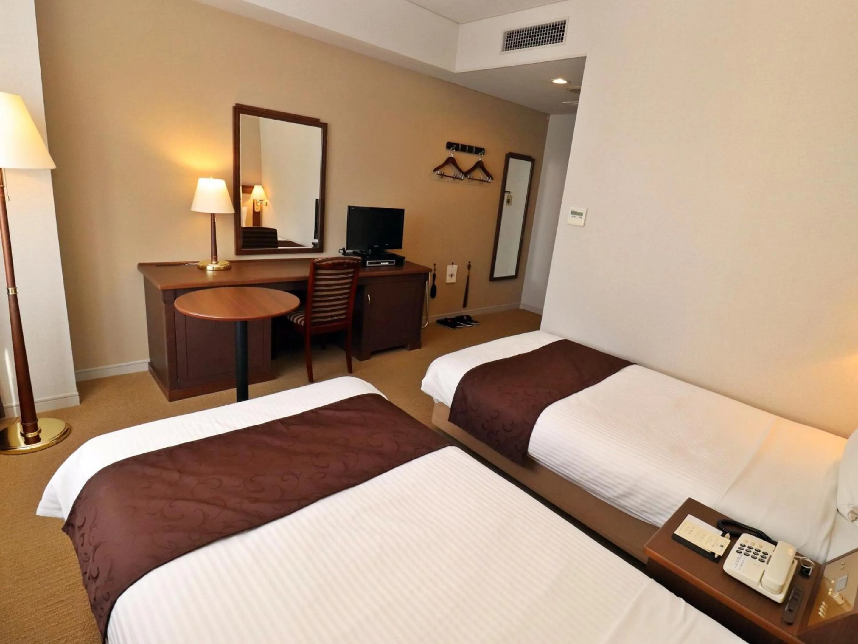 Bed in Tottori Onsen Hotel Monarque Tottori