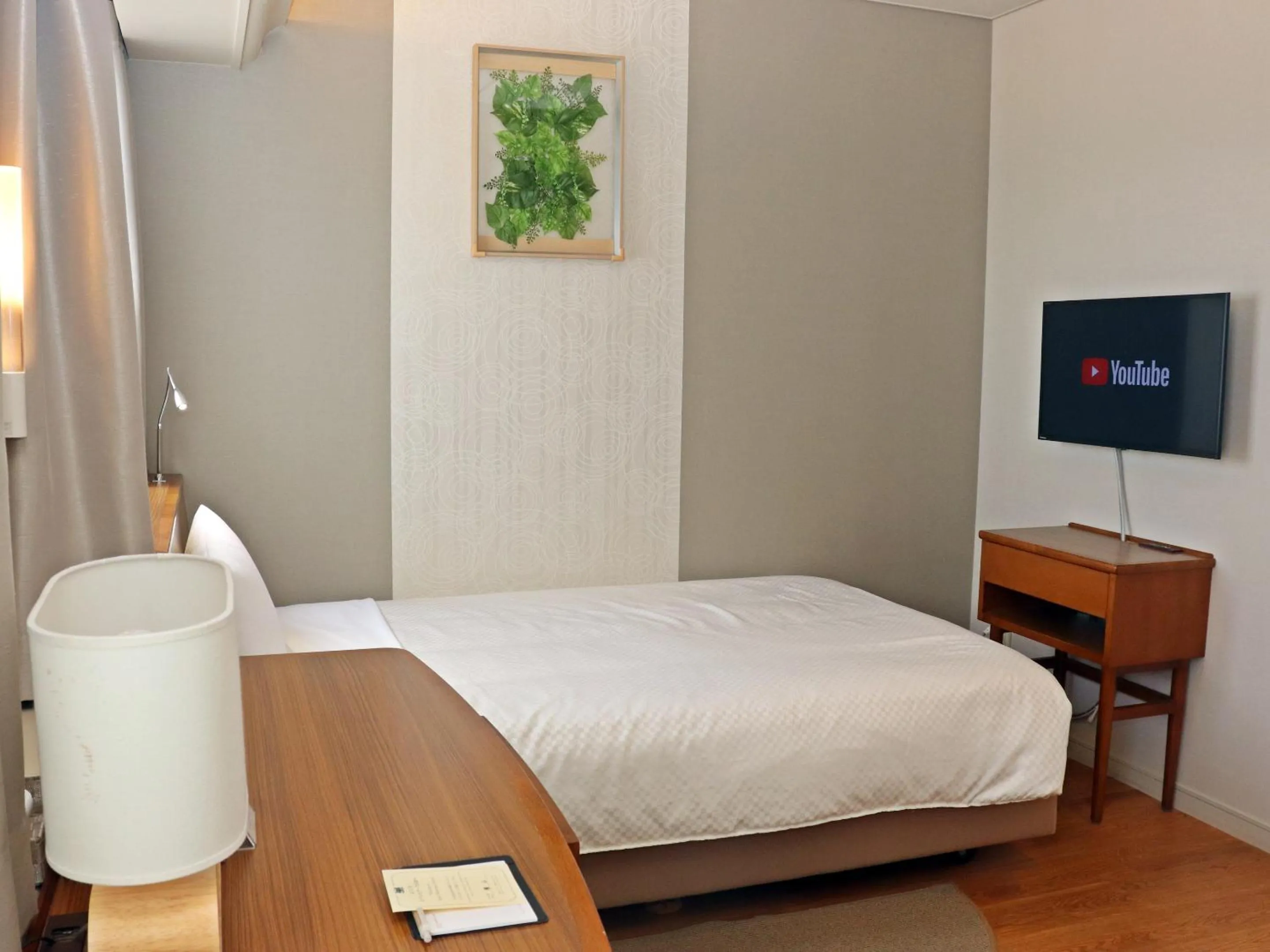 Bed in Tottori Onsen Hotel Monarque Tottori