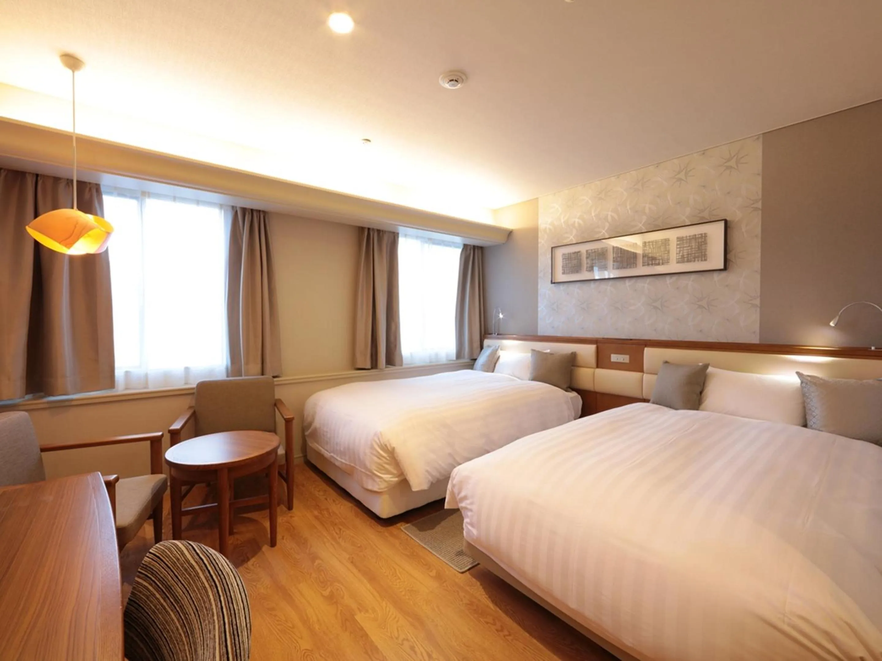 Photo of the whole room, Bed in Tottori Onsen Hotel Monarque Tottori