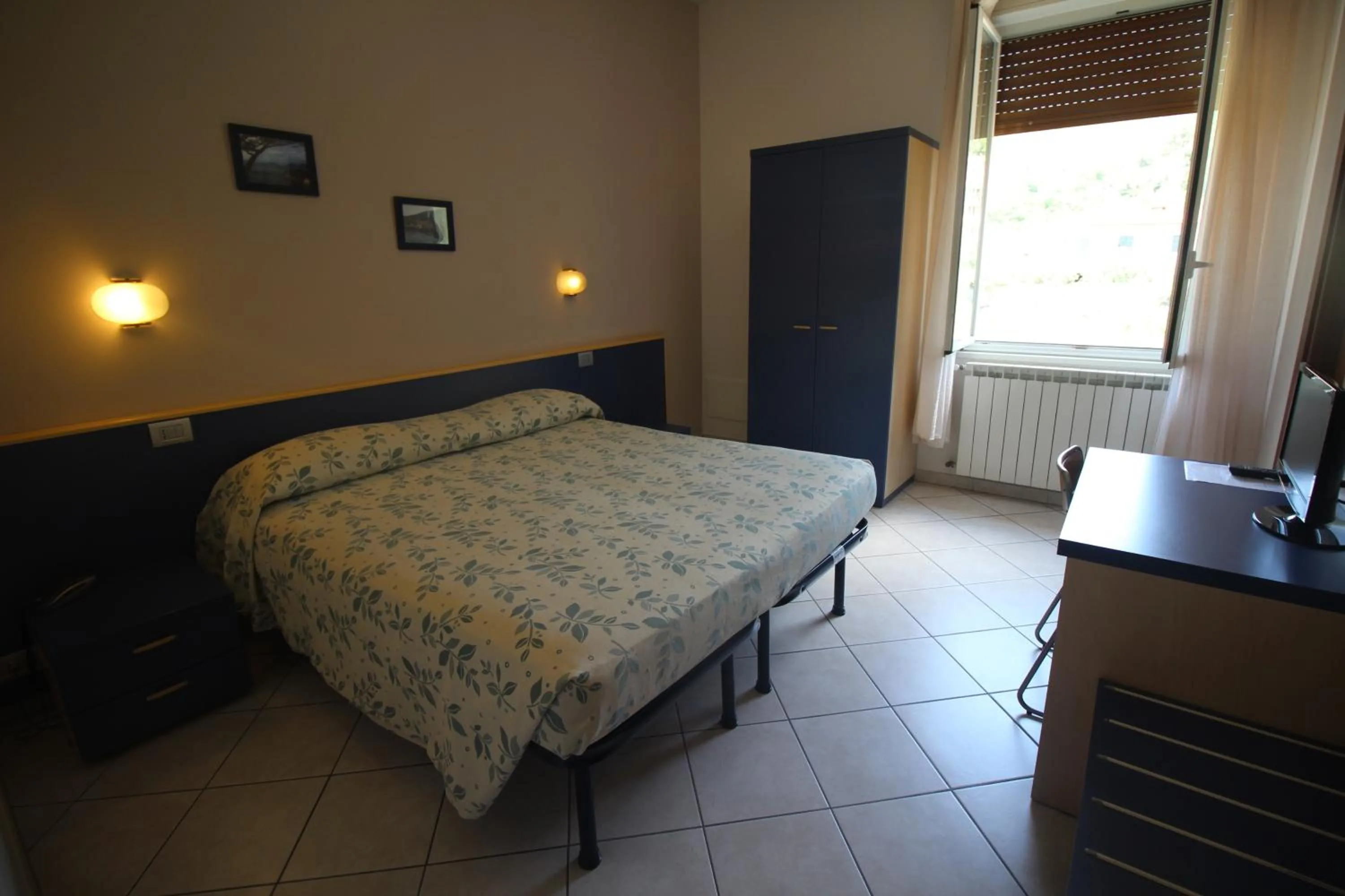 Bed in Albergo La Mimosa