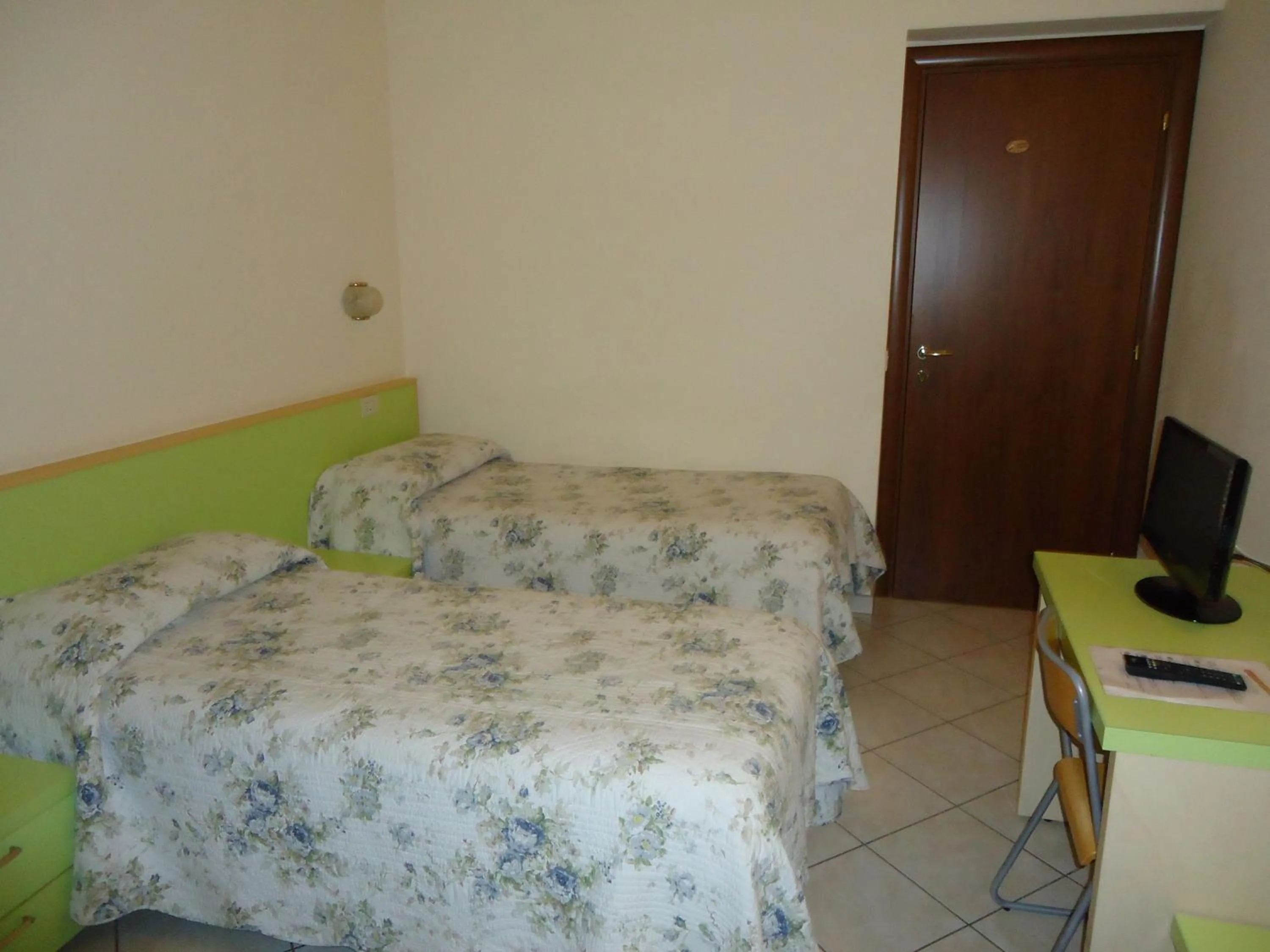 Photo of the whole room, Bed in Albergo La Mimosa
