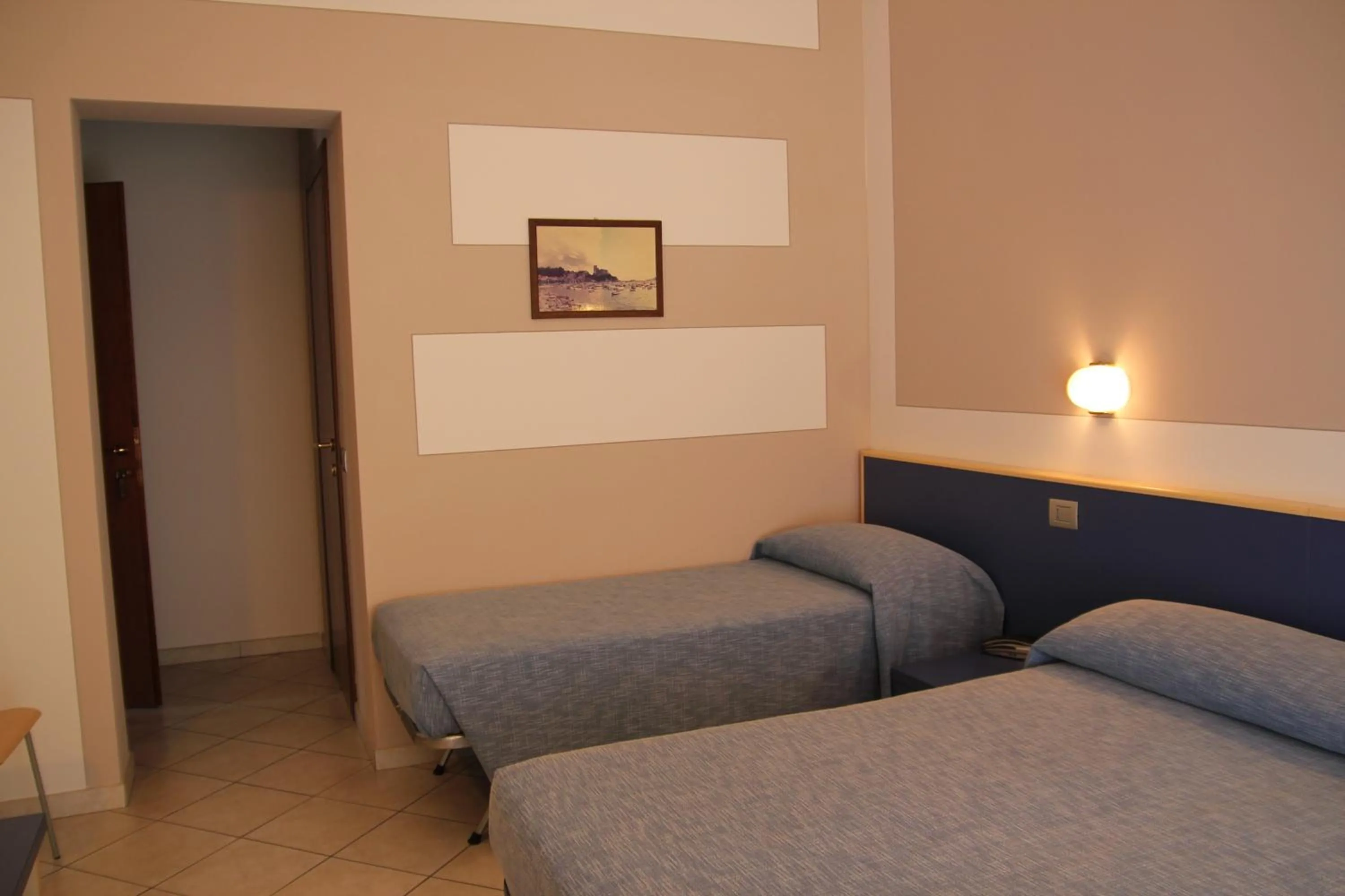 Photo of the whole room, Bed in Albergo La Mimosa