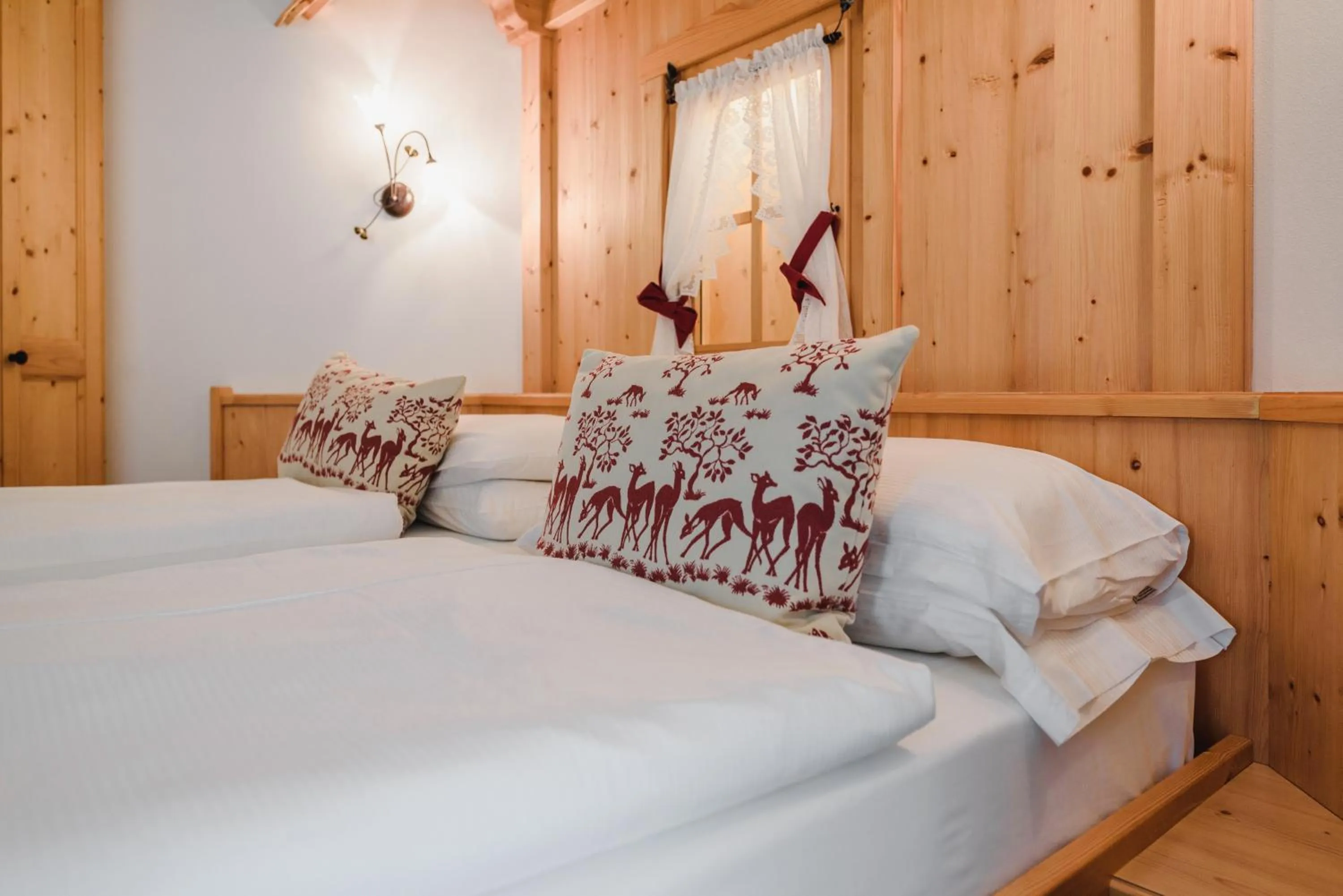 Bed in Hotel Des Alpes