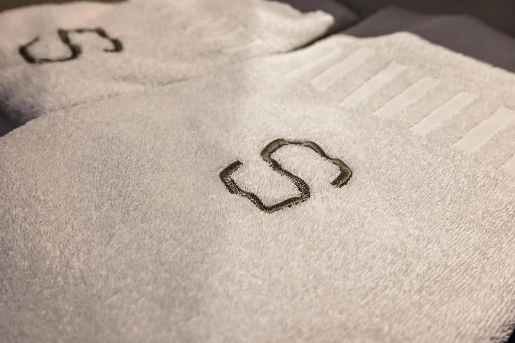 Property logo or sign in Square Hotel