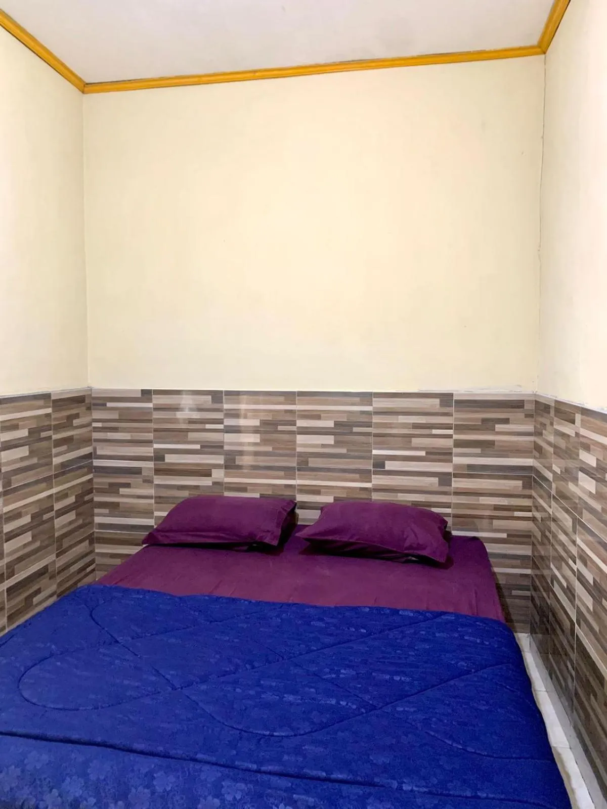 Bed in Penginapan Sedap Malam