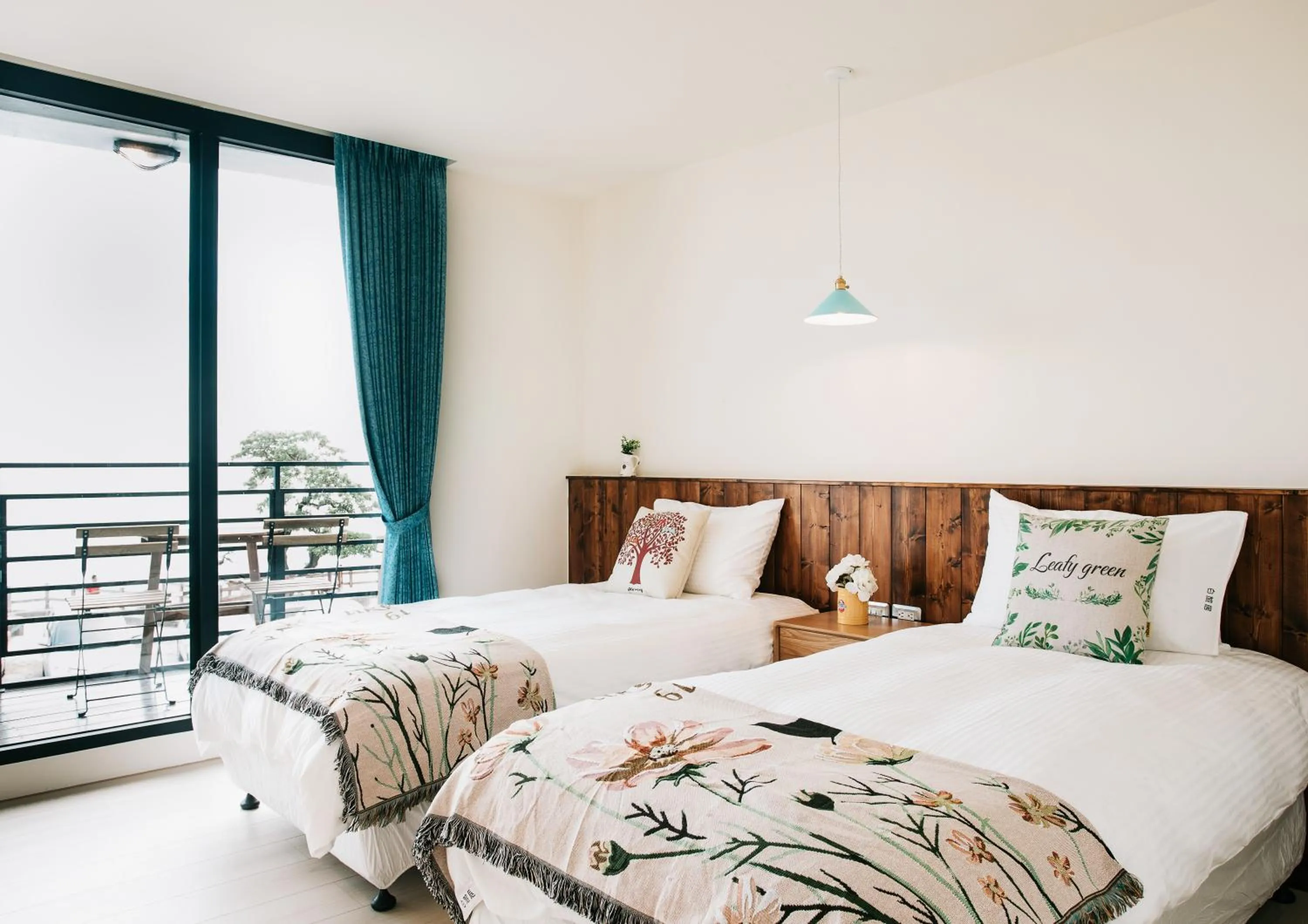 Balcony/Terrace, Bed in Chuanfanrock Haku Beach Days Inn