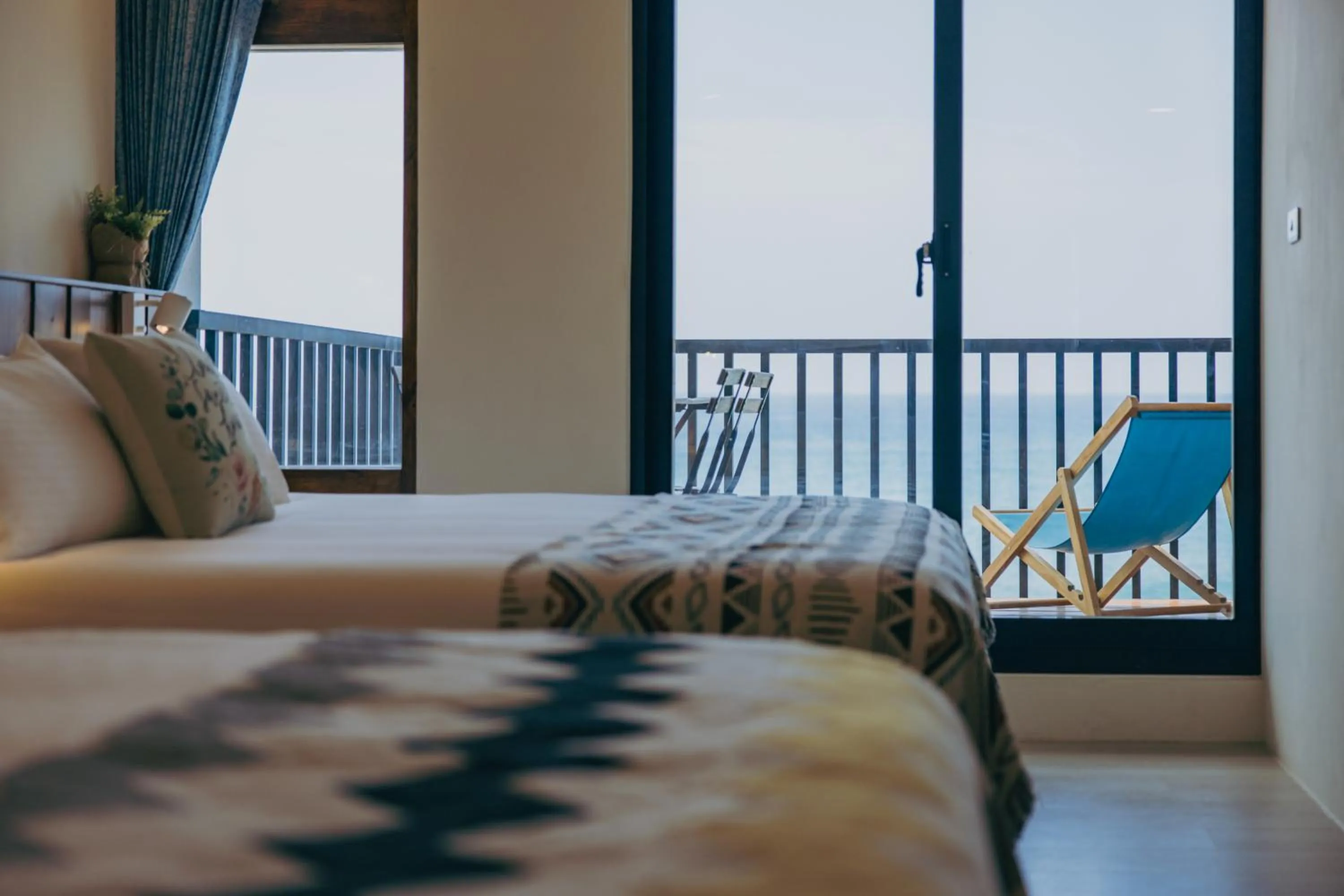 Bed in Chuanfanrock Haku Beach Days Inn