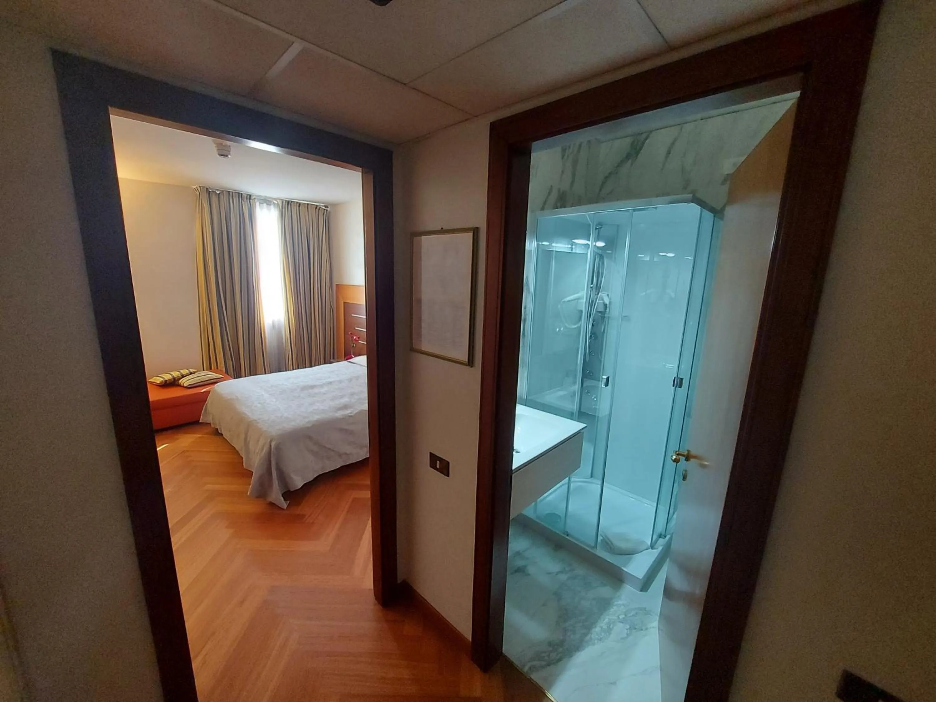 Bed in Hotel Posta 77