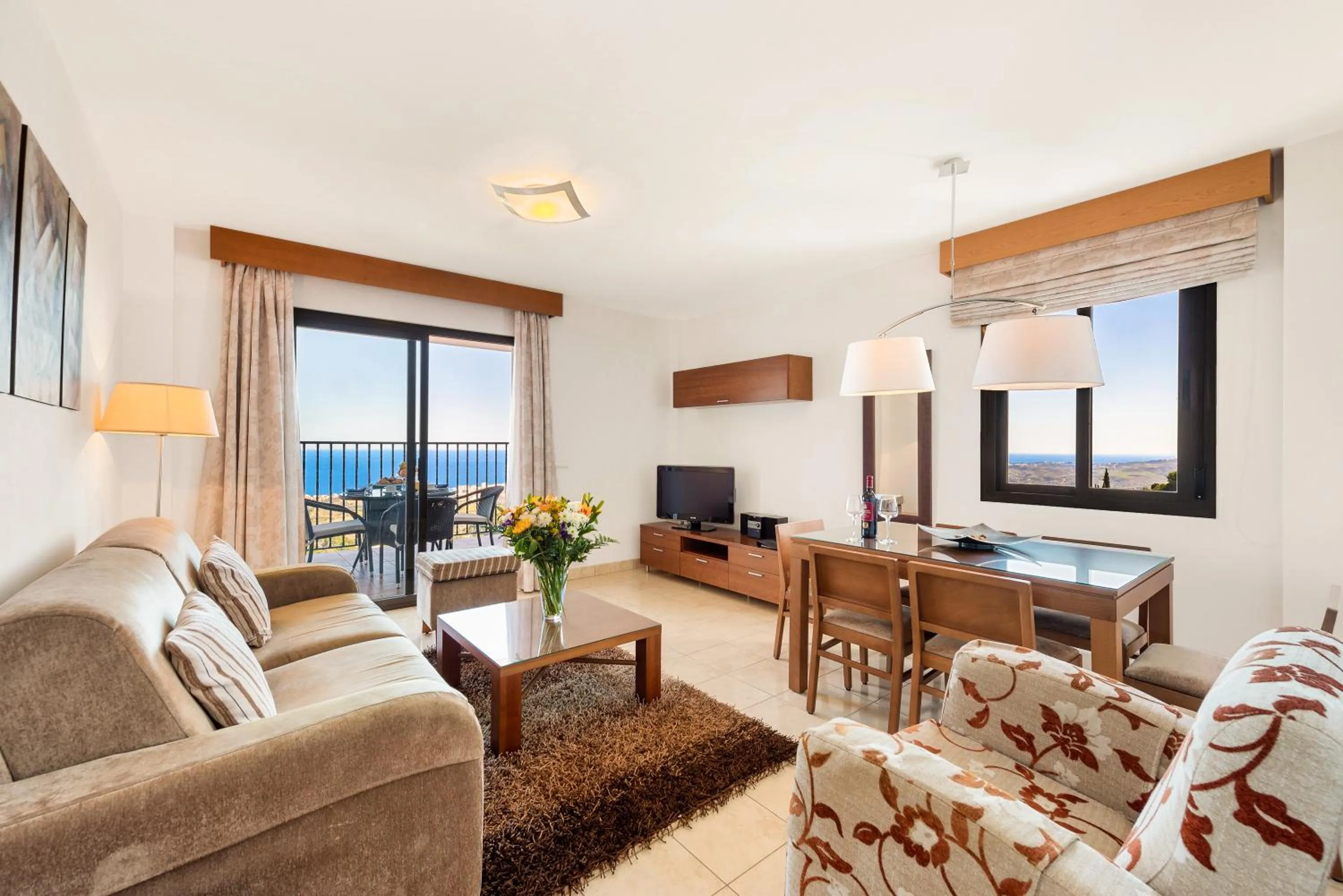 Communal lounge/ TV room in Macdonald La Ermita Resort