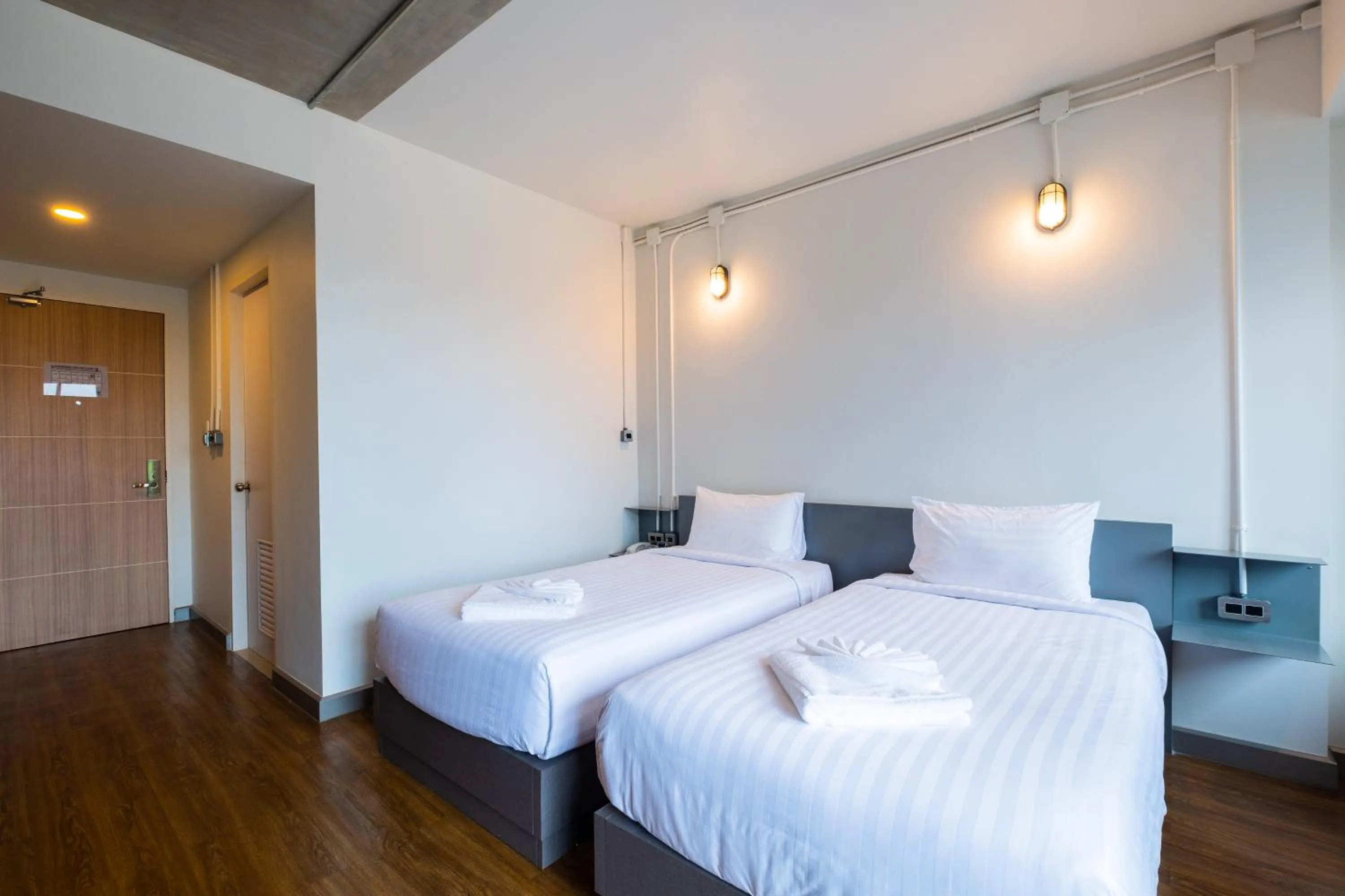 Bed in S.22 Hotel Suratthani