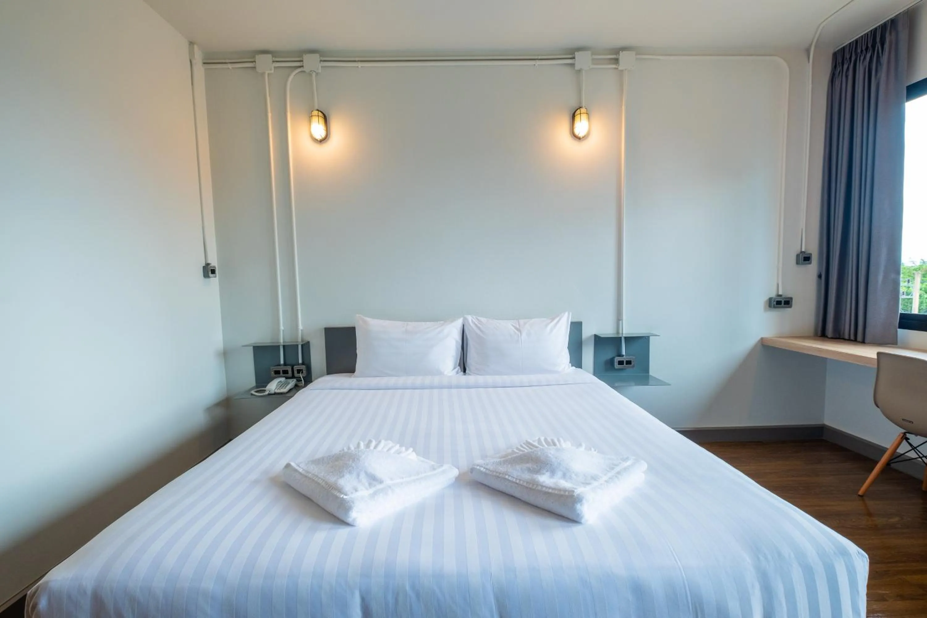 Bed in S.22 Hotel Suratthani