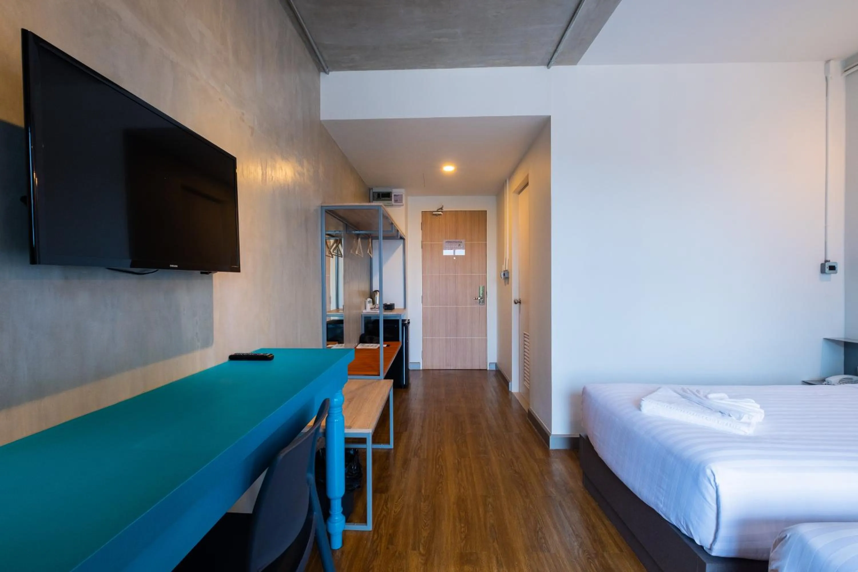 Bed in S.22 Hotel Suratthani