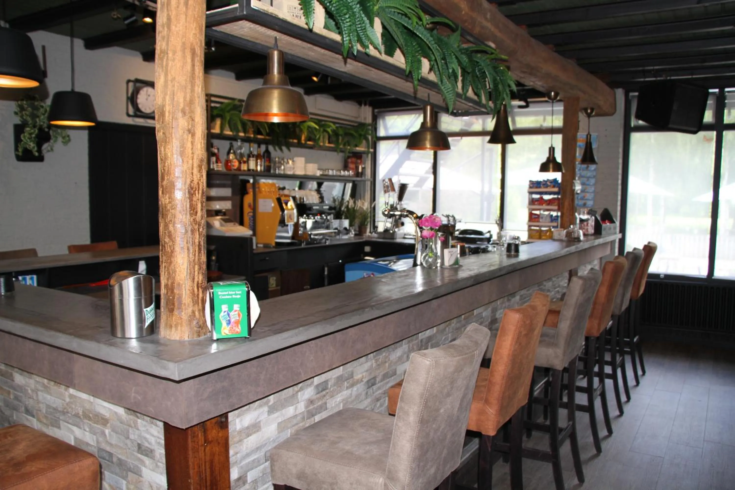 Lounge or bar in B&B de Rekkendonken