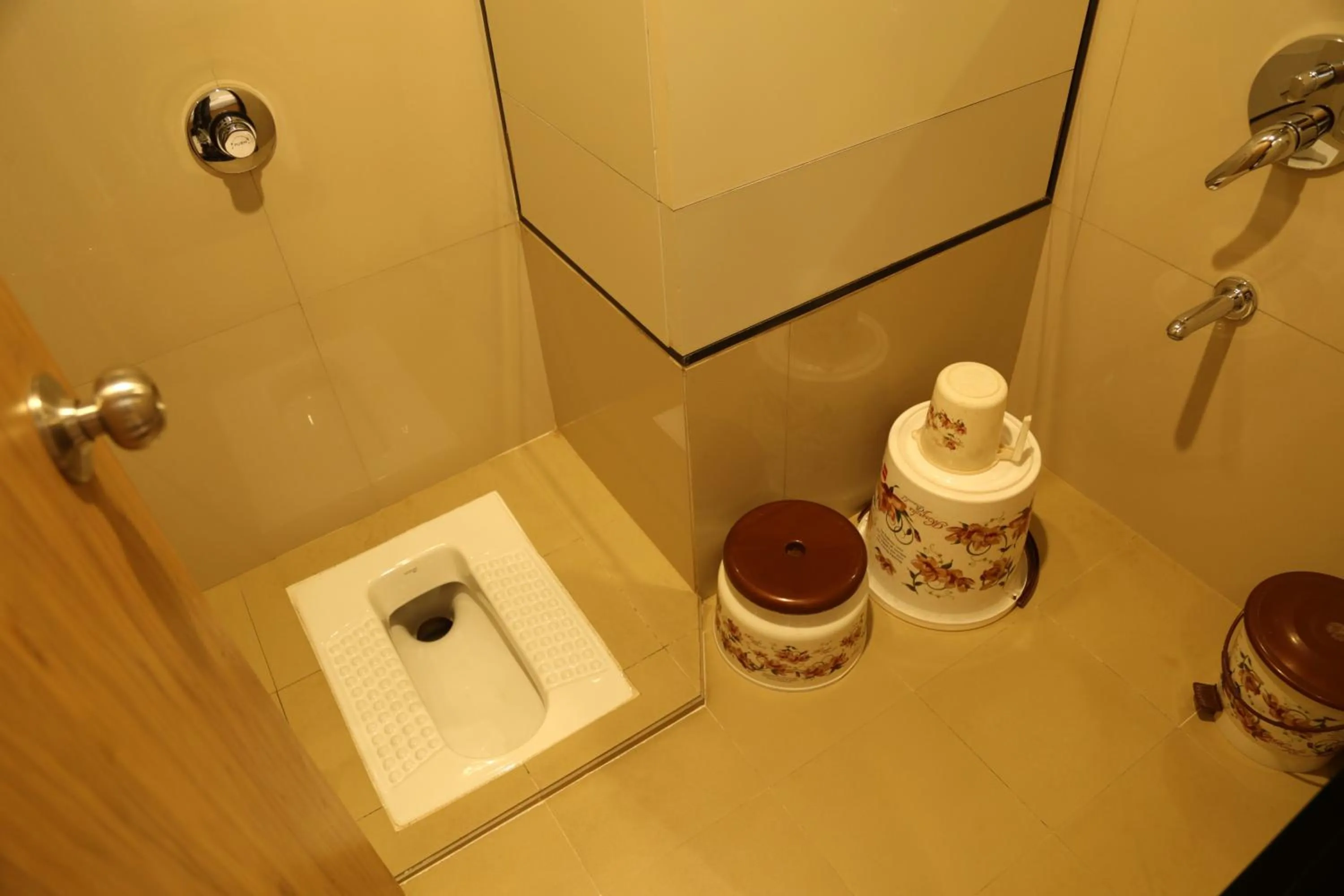 Bathroom in HOTEL MADNI ROYALE (50 Mtrs from Dargaah), Ajmer