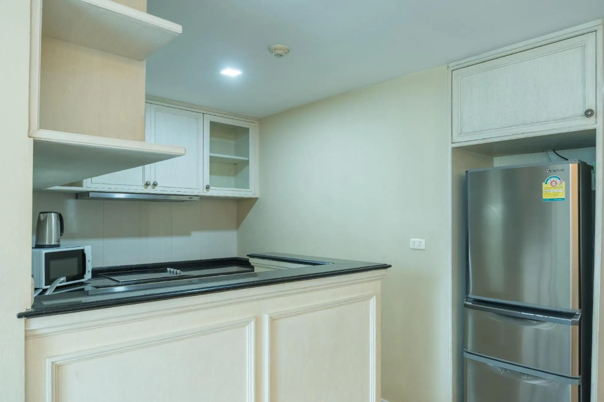 Kitchen or kitchenette in Sabai Sathorn Service Apartment