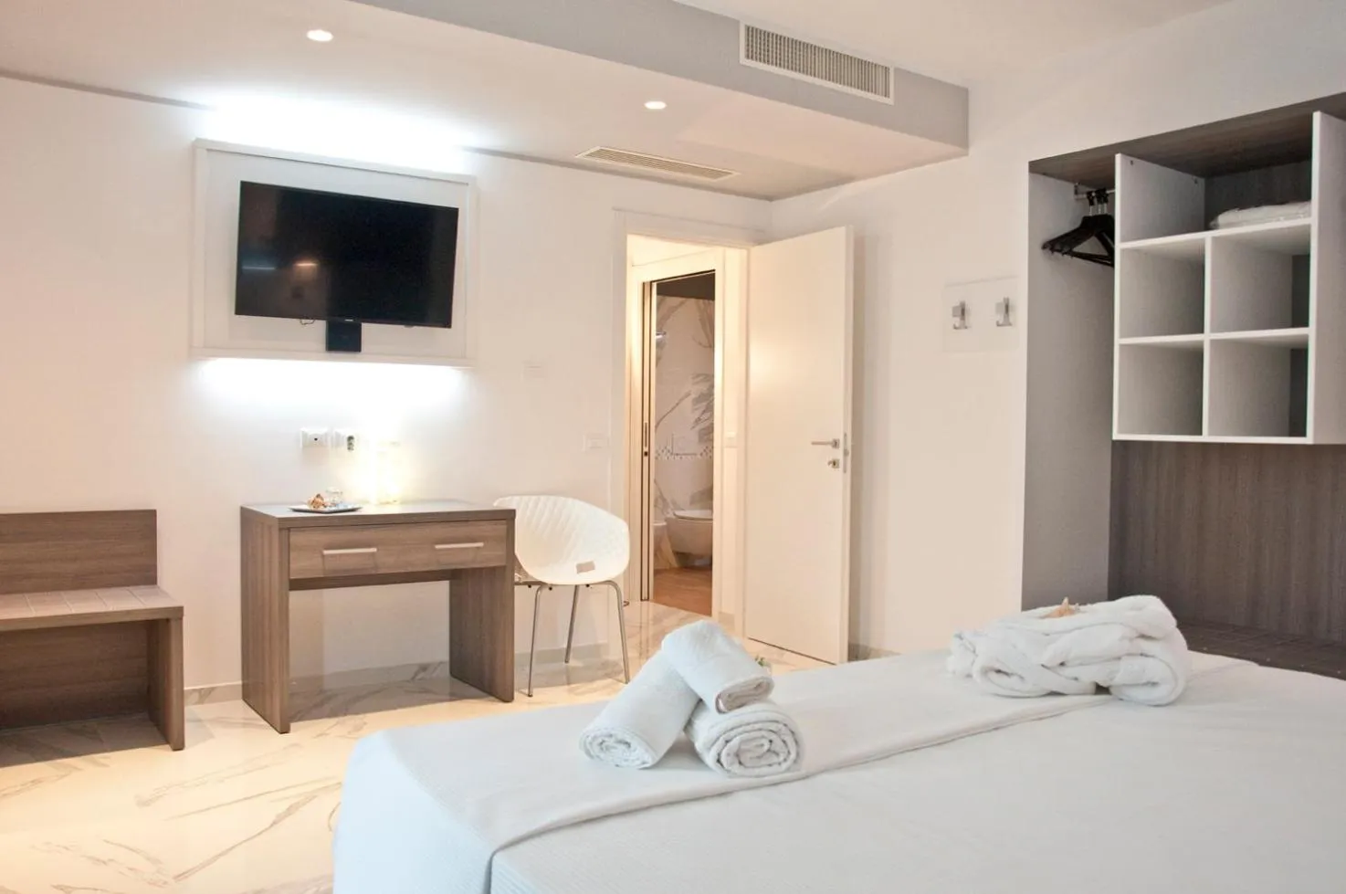 Photo of the whole room, Bed in Ambruosi Village Resort & SPA