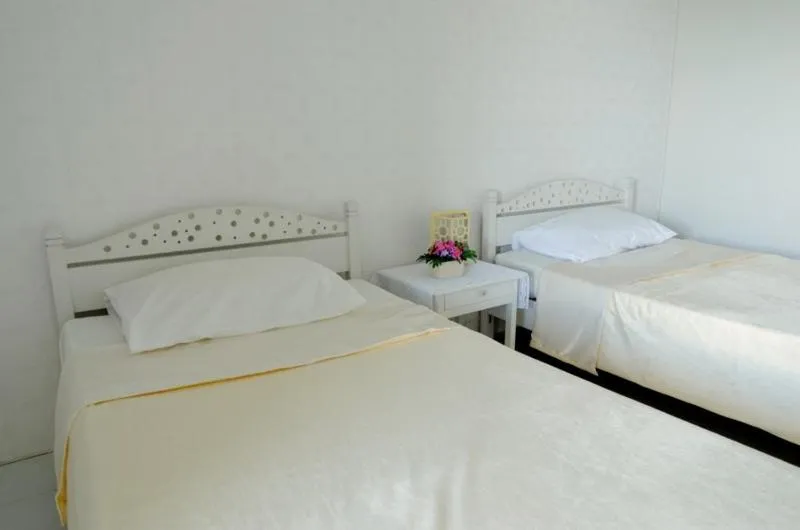 Bed in Chomdao Hotel