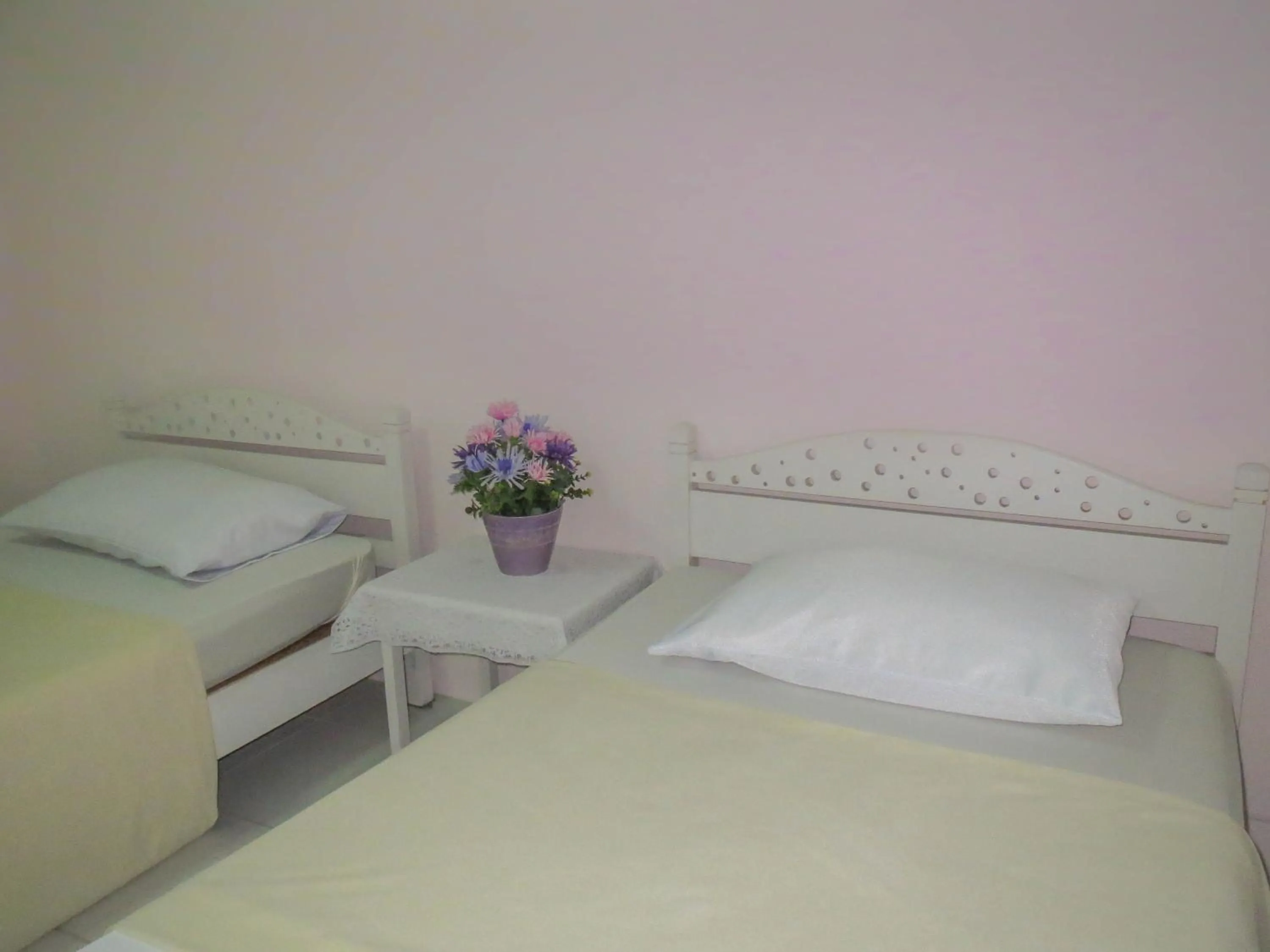 Bed in Chomdao Hotel