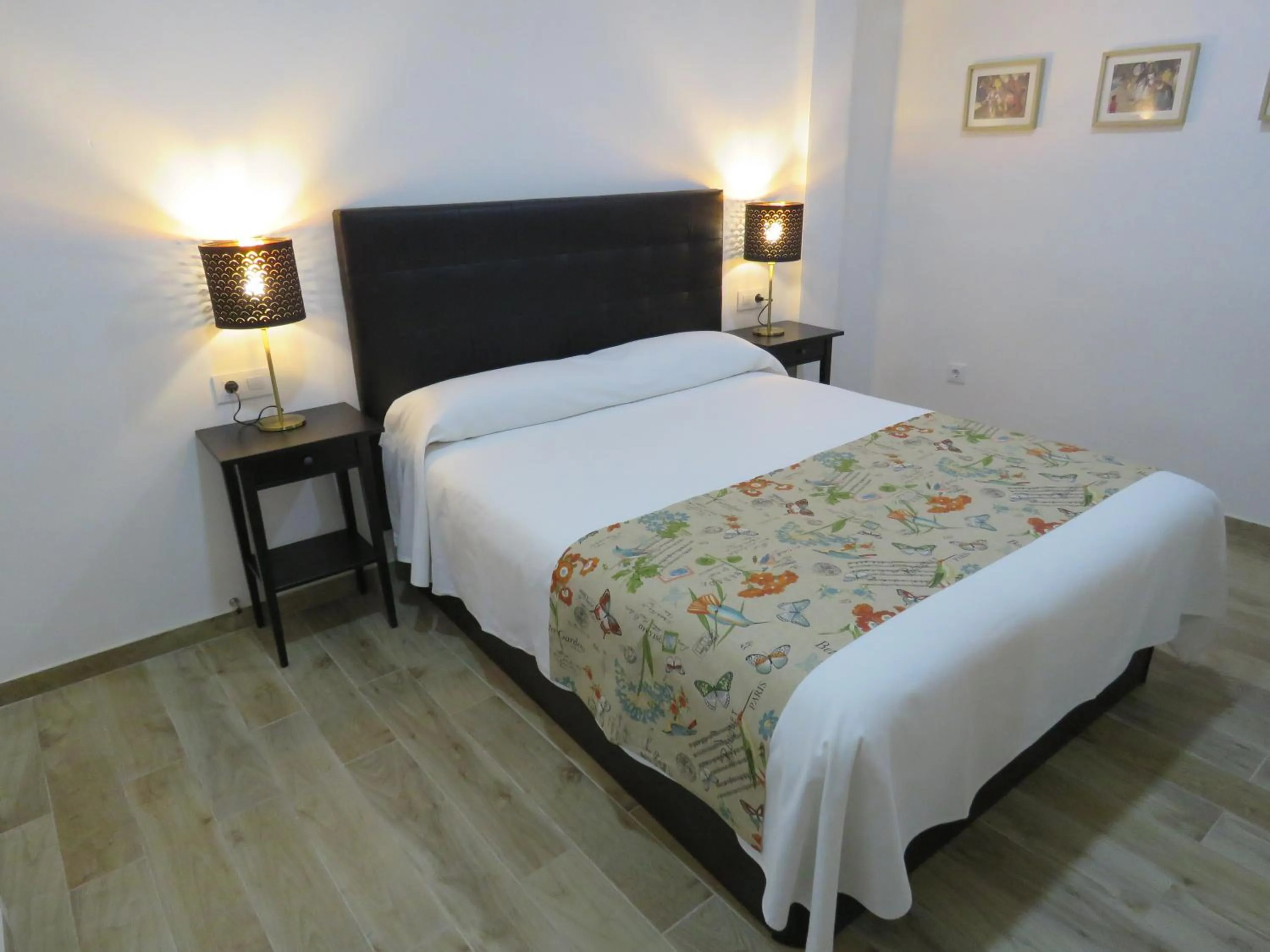 Bed in Living Sevilla Apartments Hércules