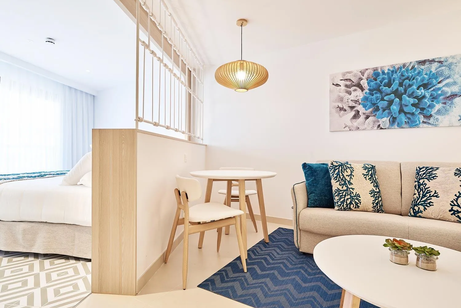 Living room, Bed in Eurostars Ibiza