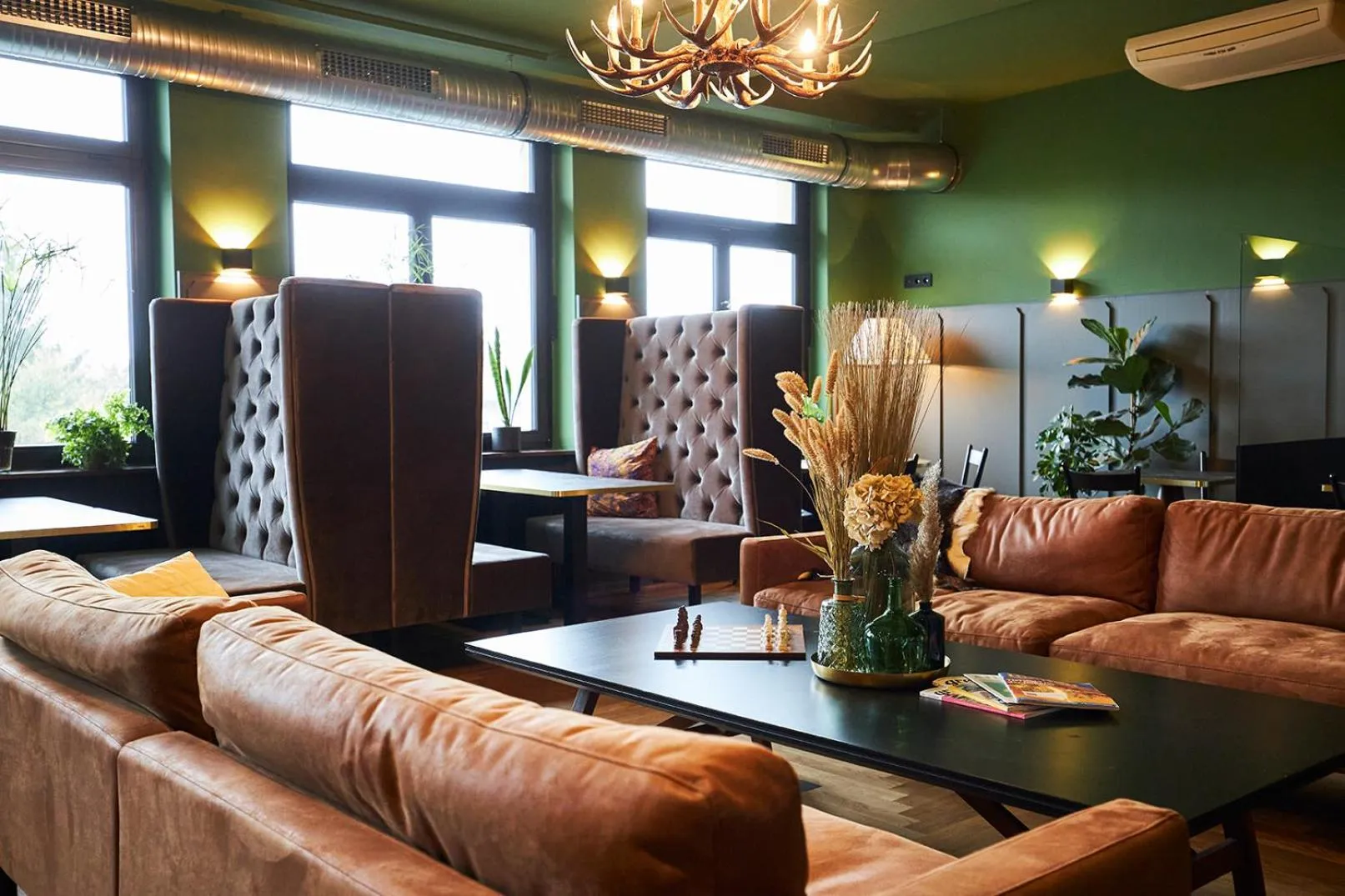 Communal lounge/ TV room in ERCK- Hotel & Gastronomie