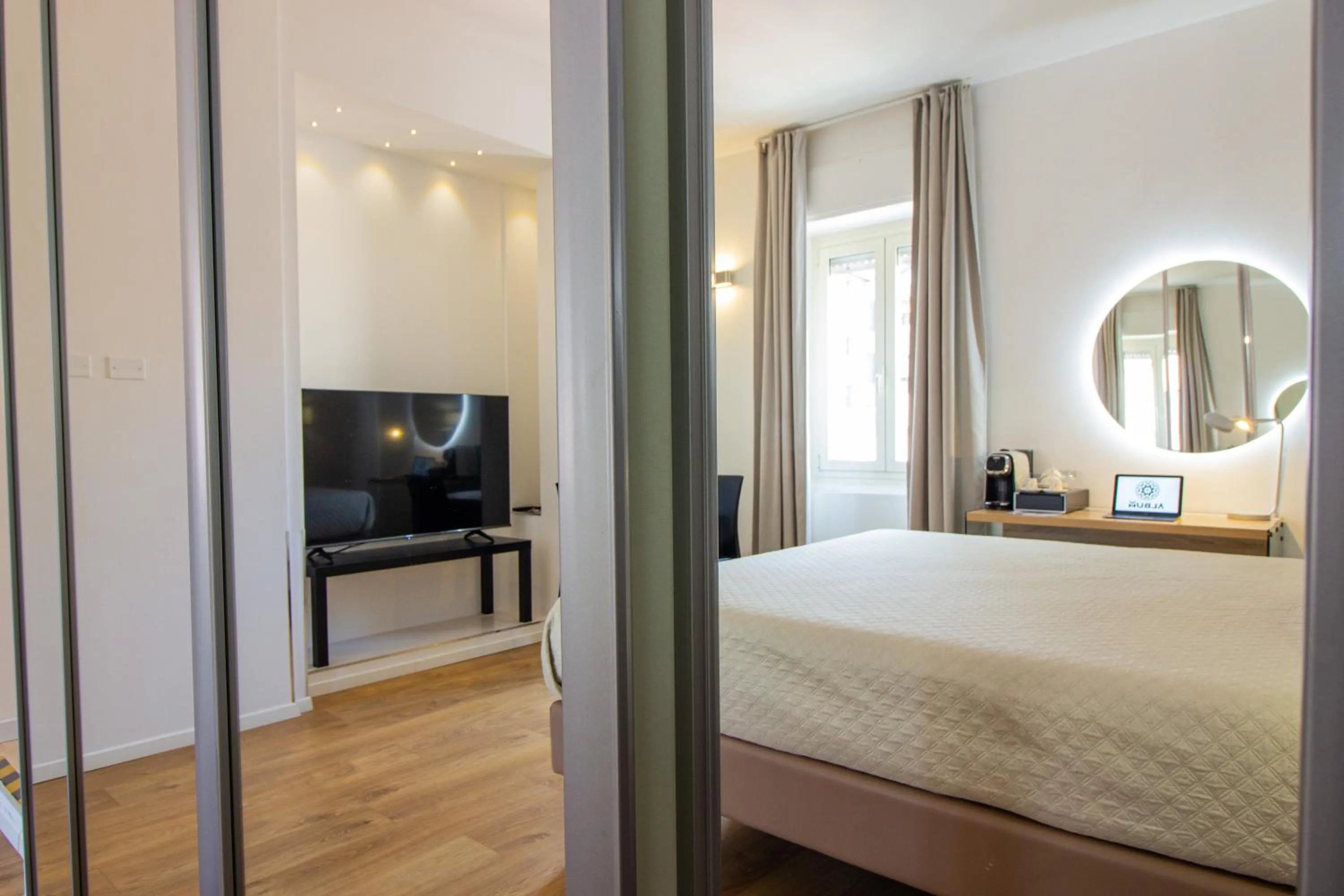 Bed in Album Boutique Rooms