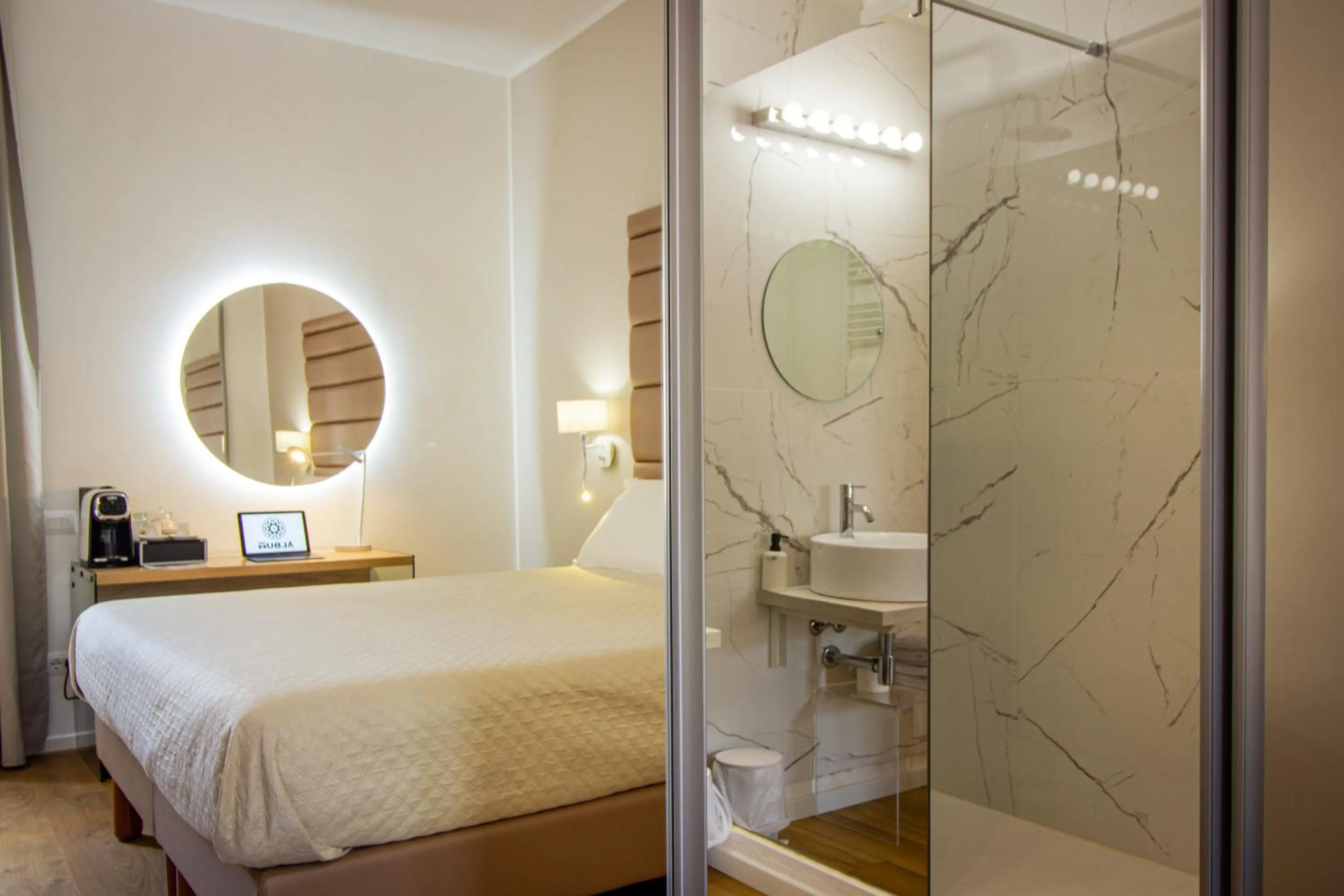 Shower, Bed in Album Boutique Rooms