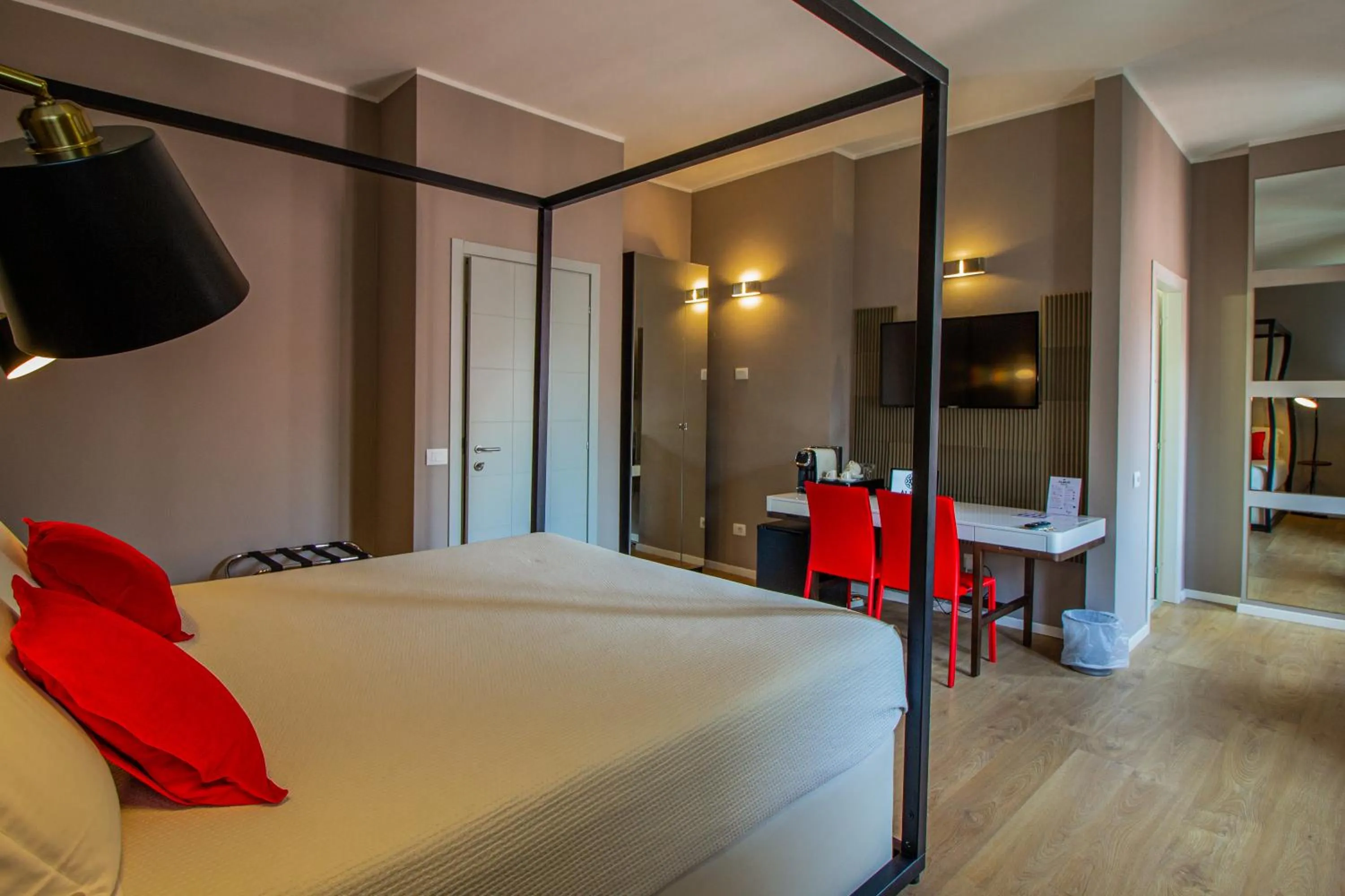 Photo of the whole room, Bed in Album Boutique Rooms