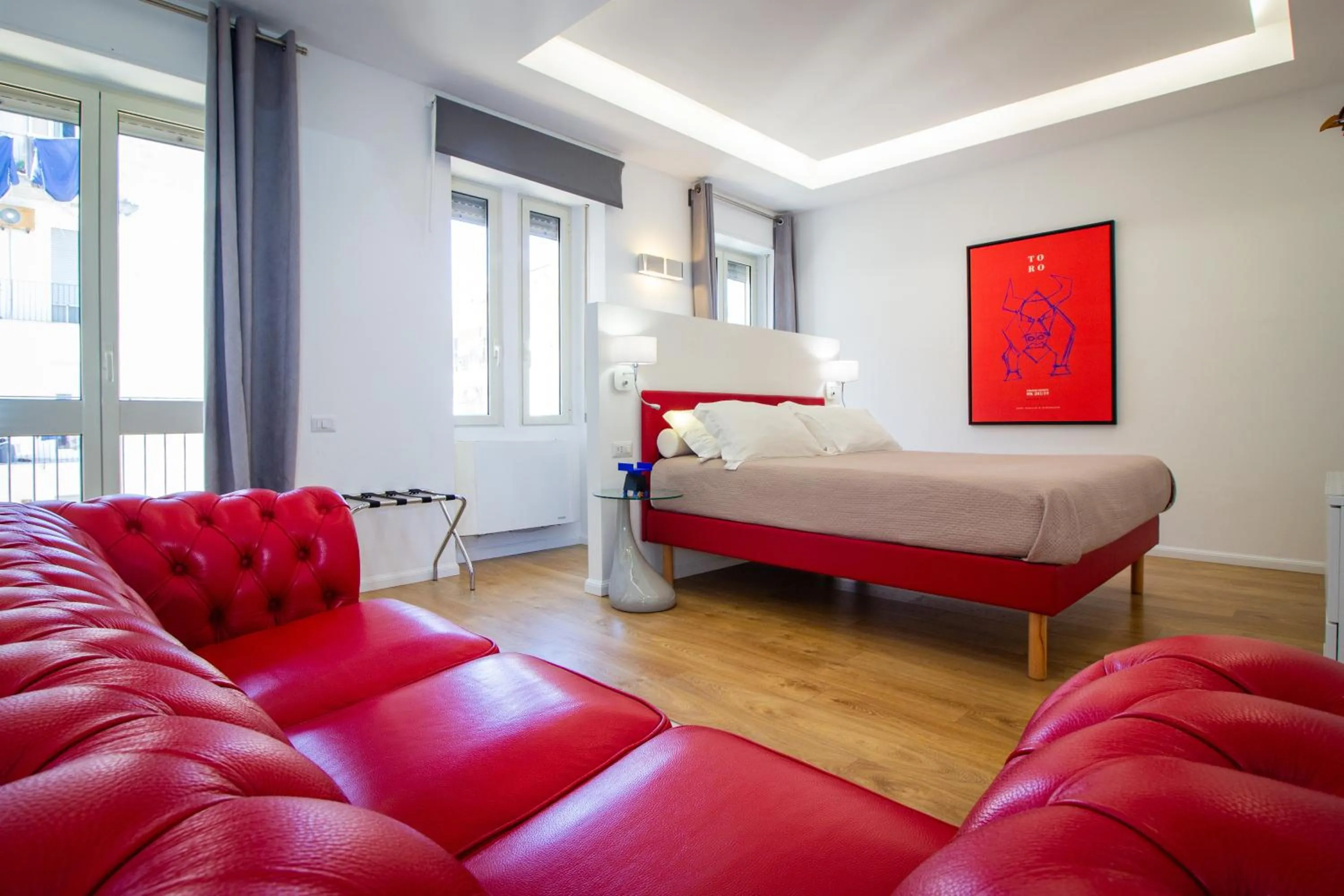 Bed in Album Boutique Rooms