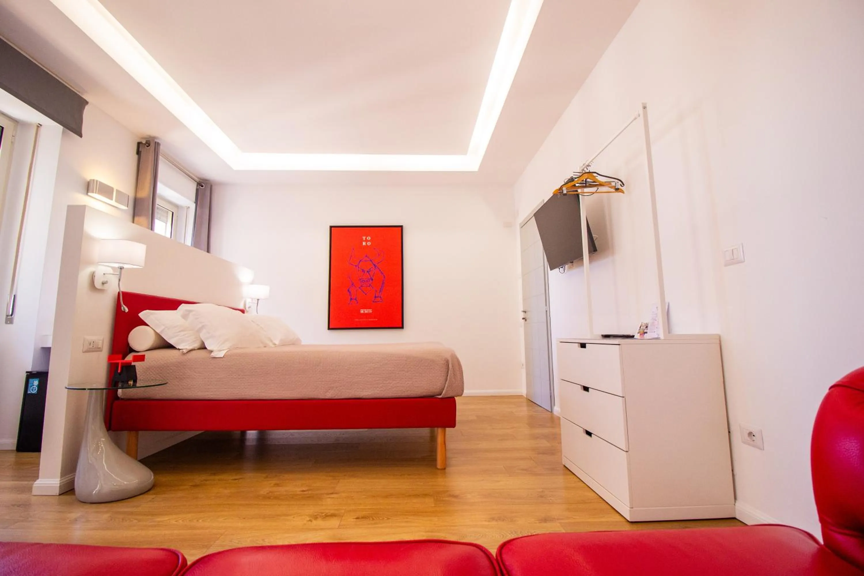 Bed in Album Boutique Rooms