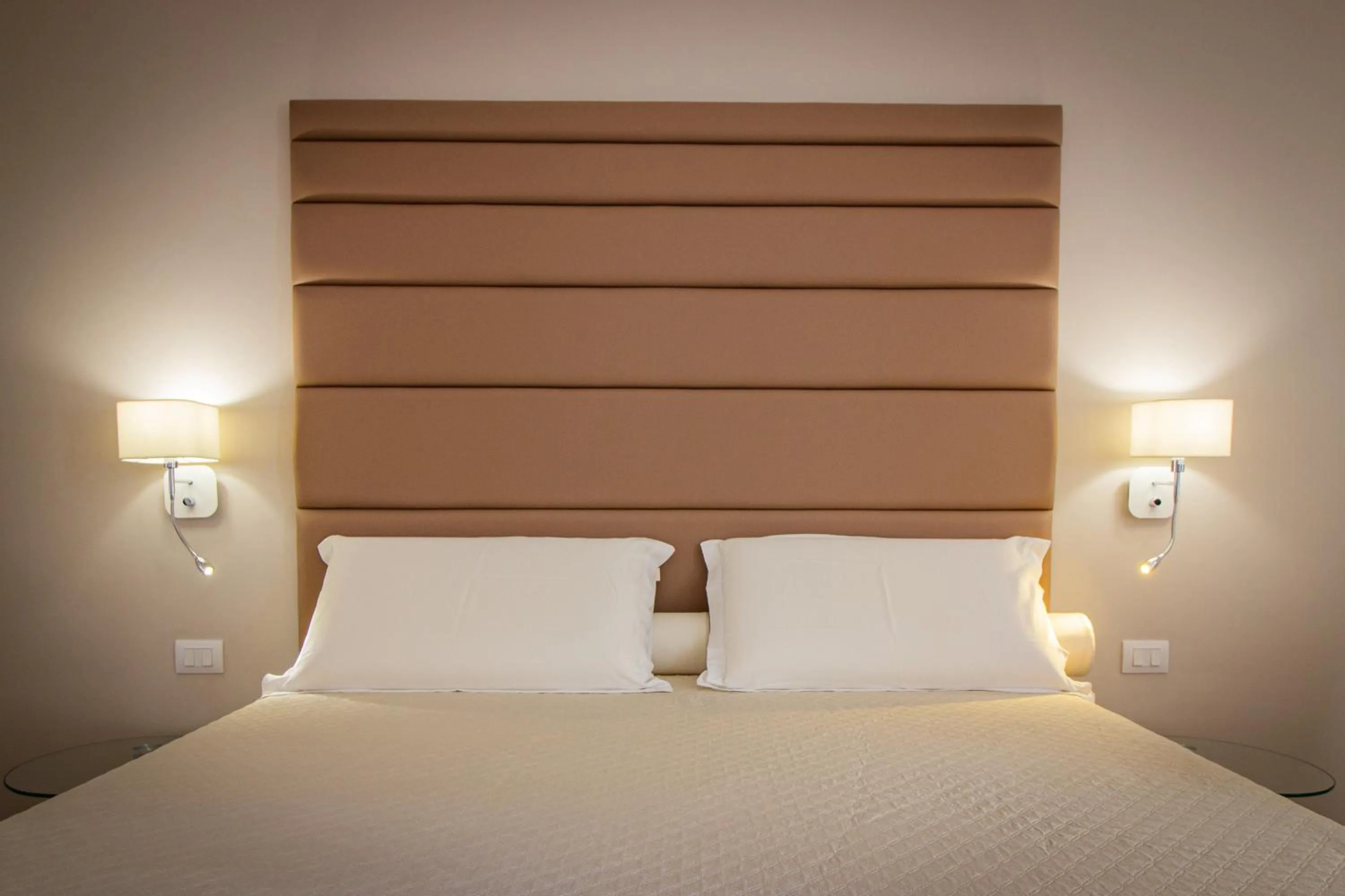 Bed in Album Boutique Rooms