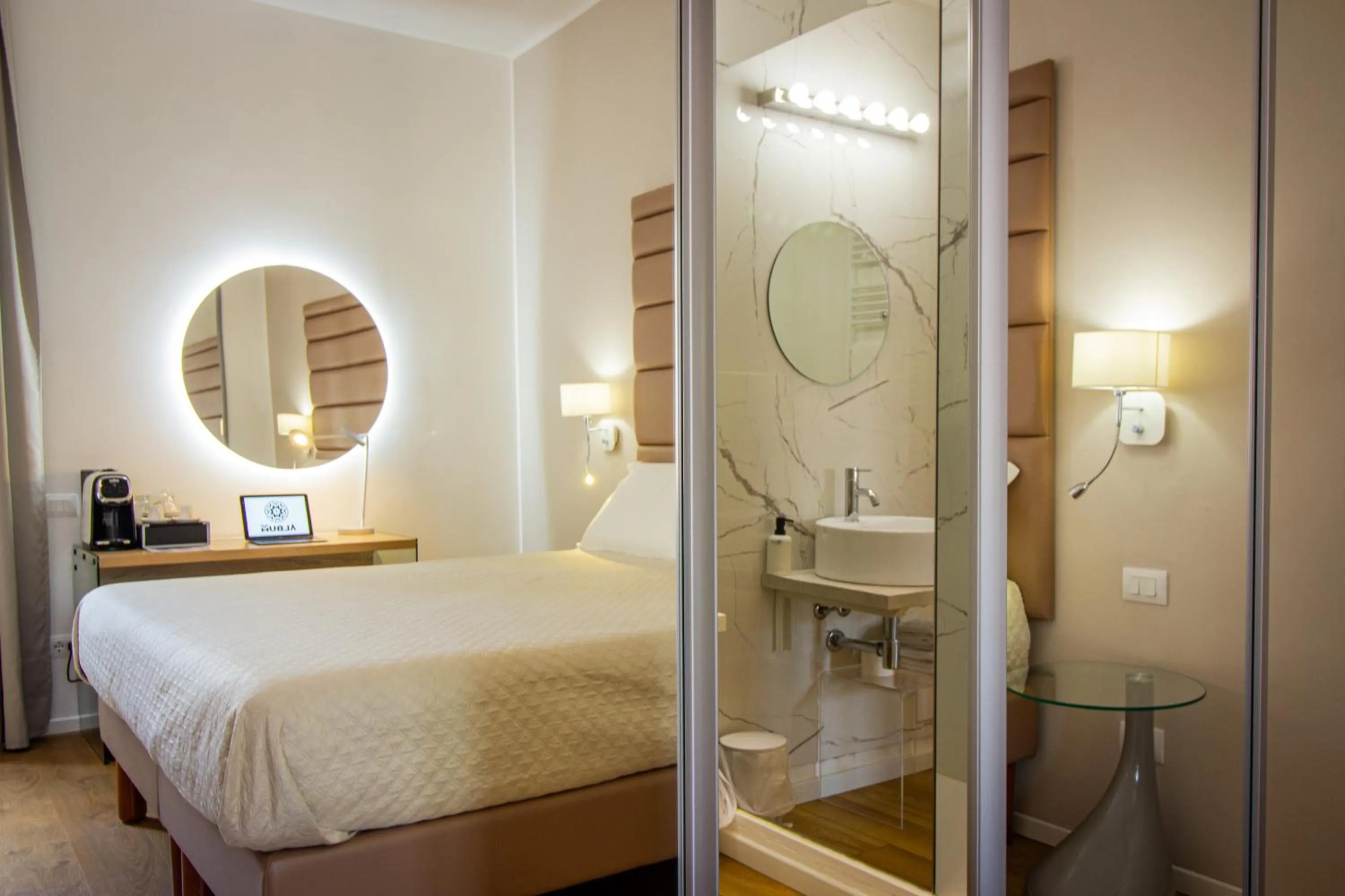 Bed in Album Boutique Rooms