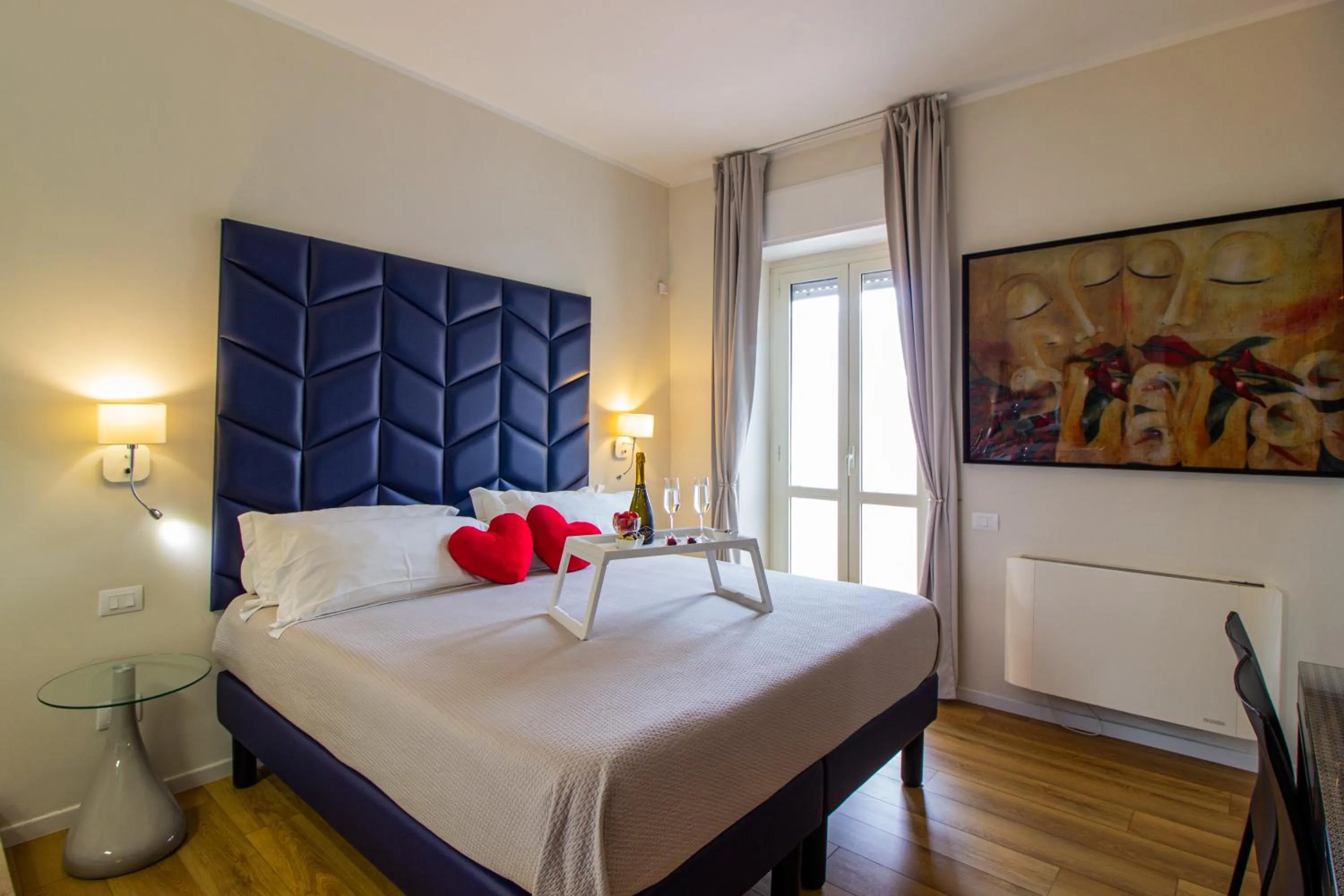 Photo of the whole room, Bed in Album Boutique Rooms