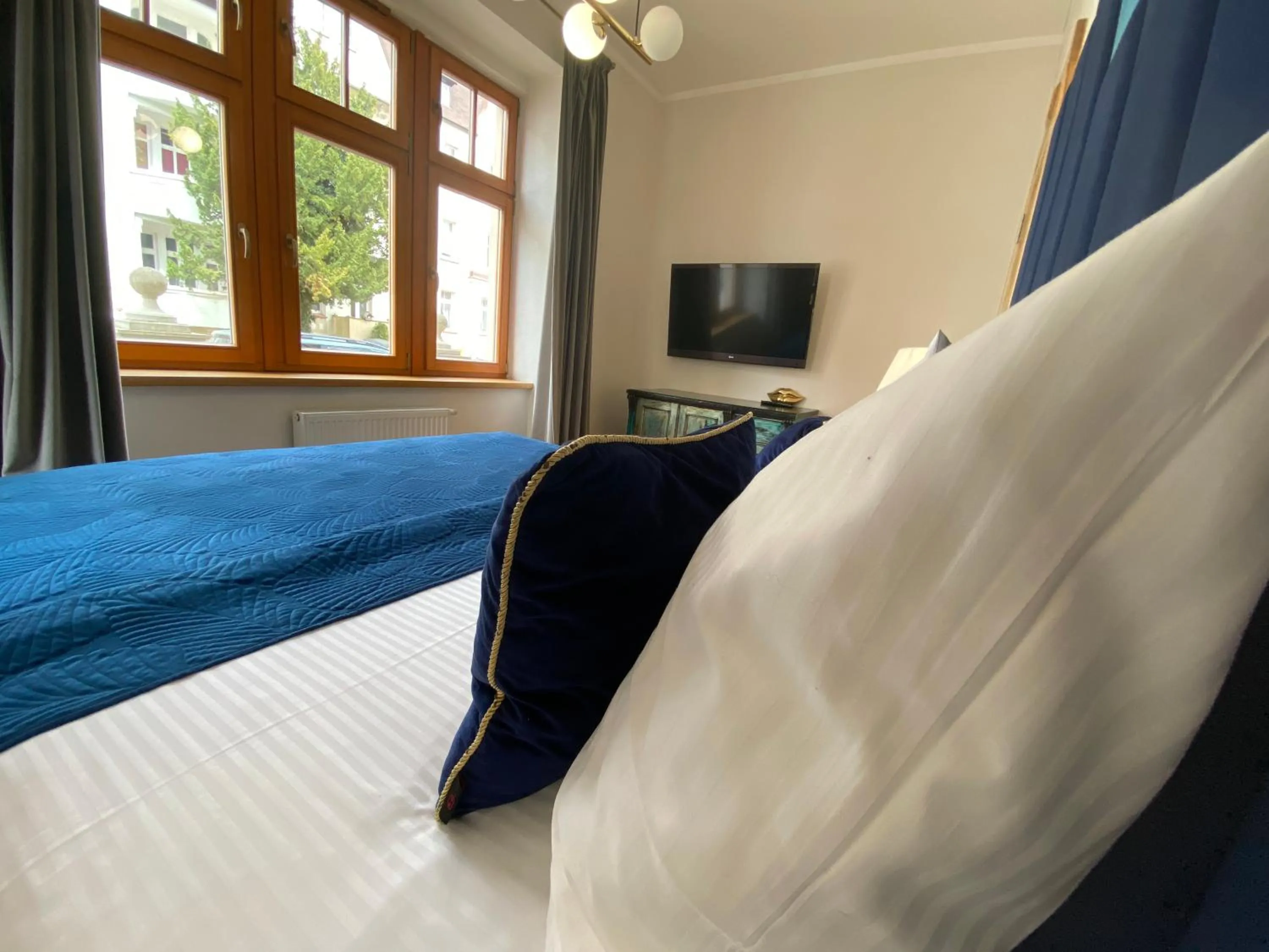 Bed in Dali ApartHOTEL