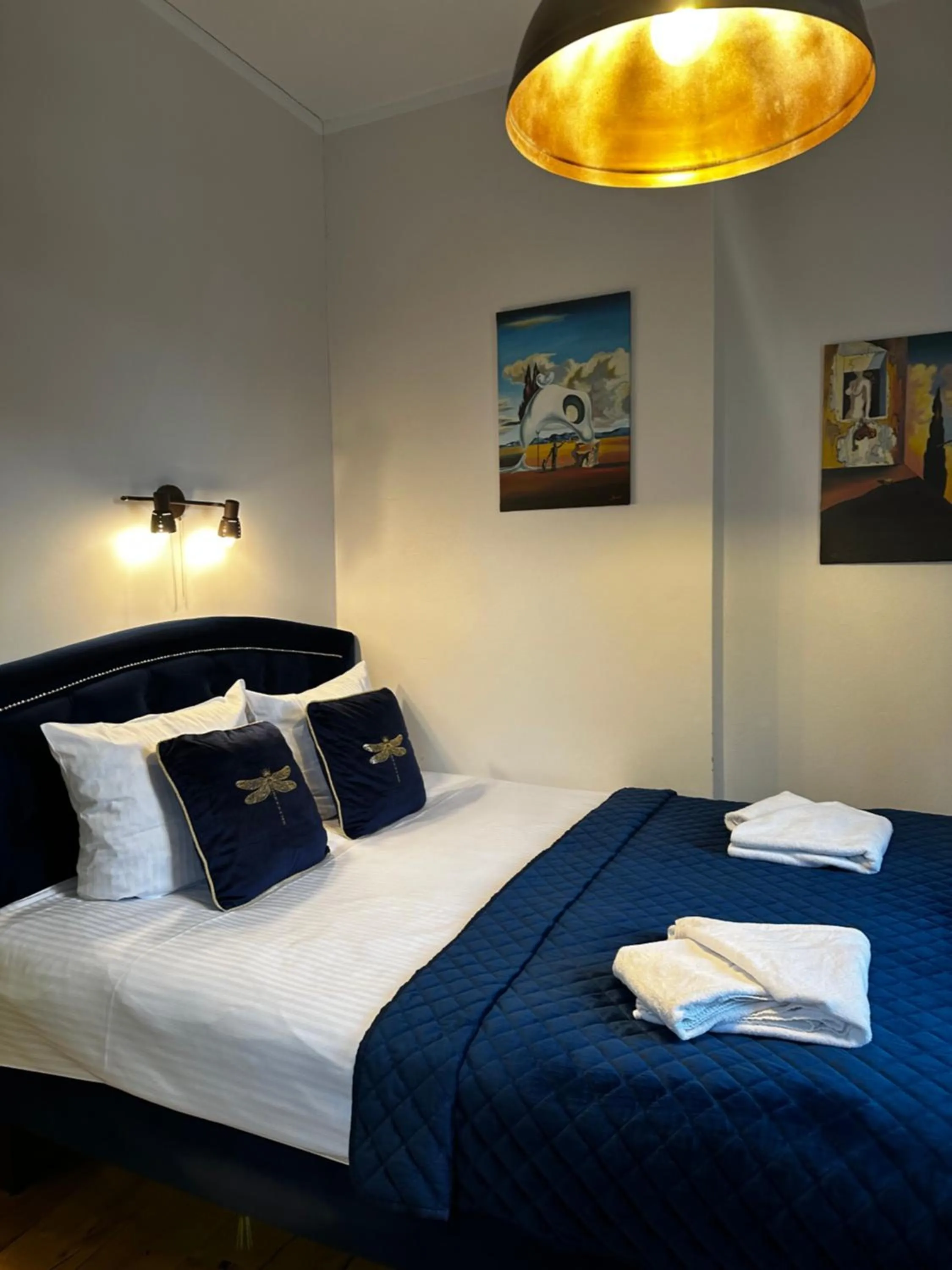 Bed in Dali ApartHOTEL