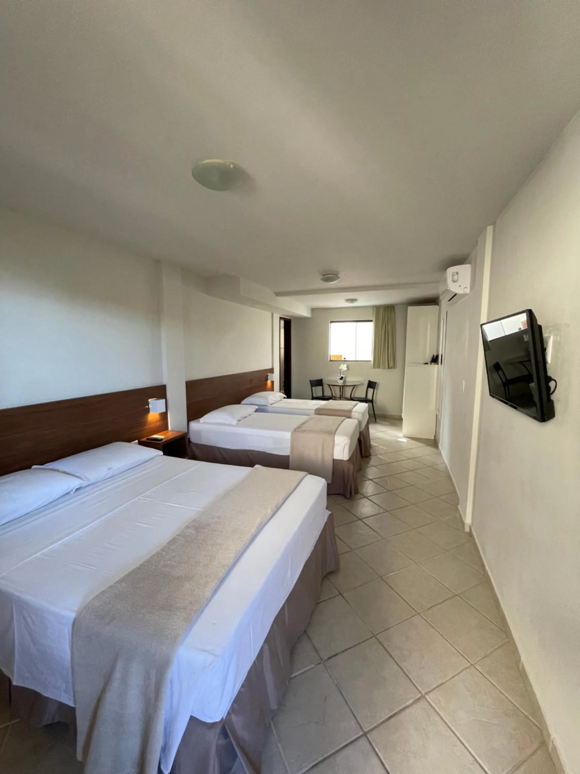 Bed in Pousada Laranja - Nova Administração