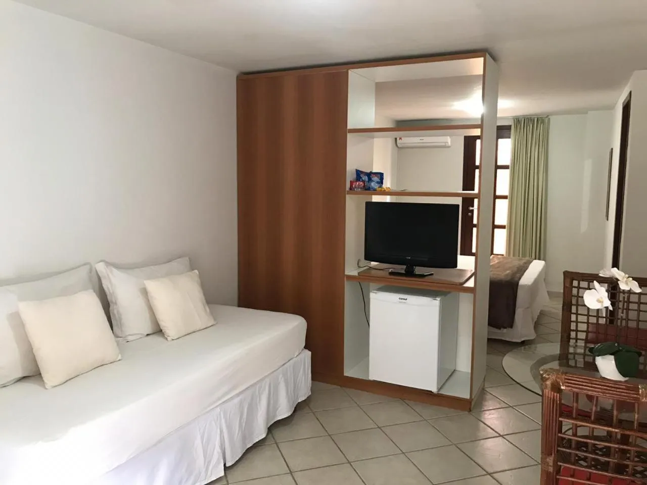 Bed in Pousada Laranja - Nova Administração