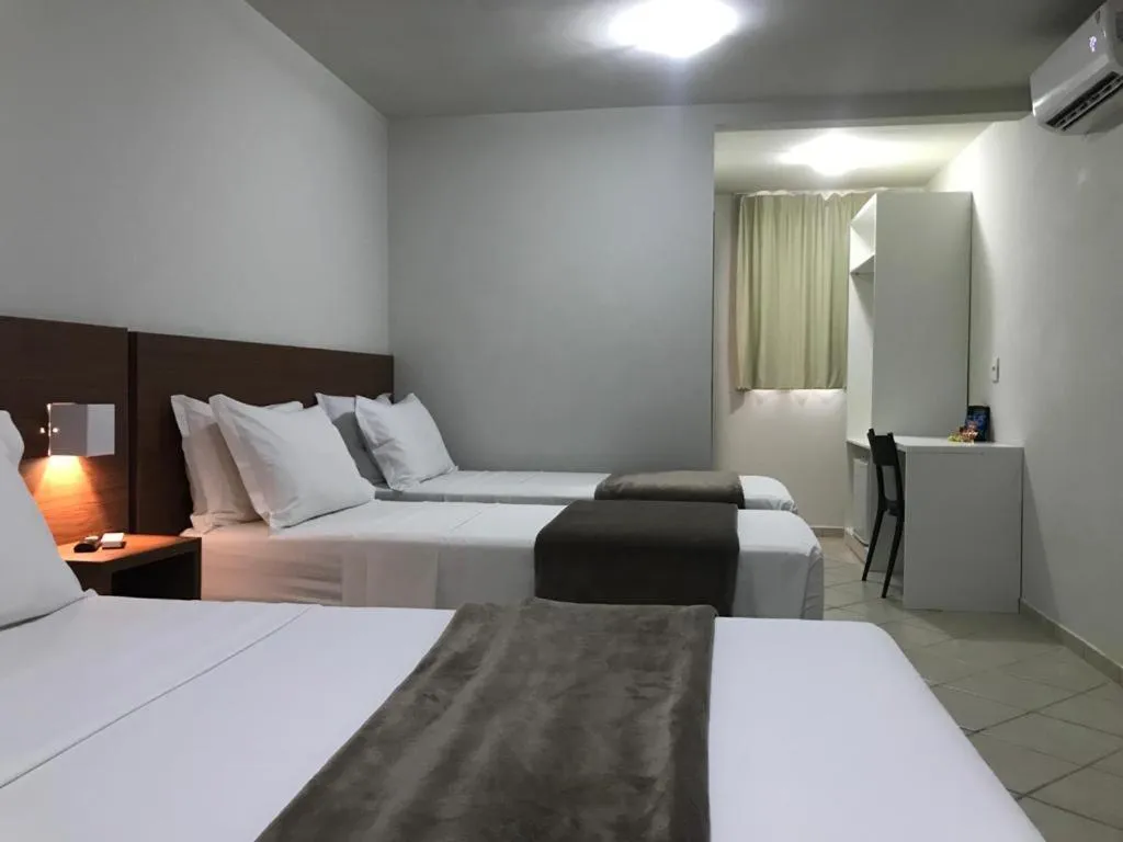 Bed in Pousada Laranja - Nova Administração