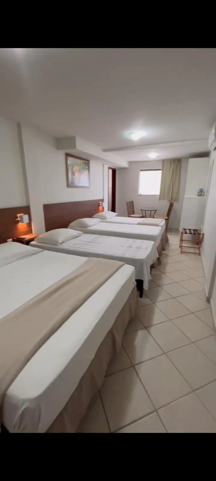 Bed in Pousada Laranja - Nova Administração