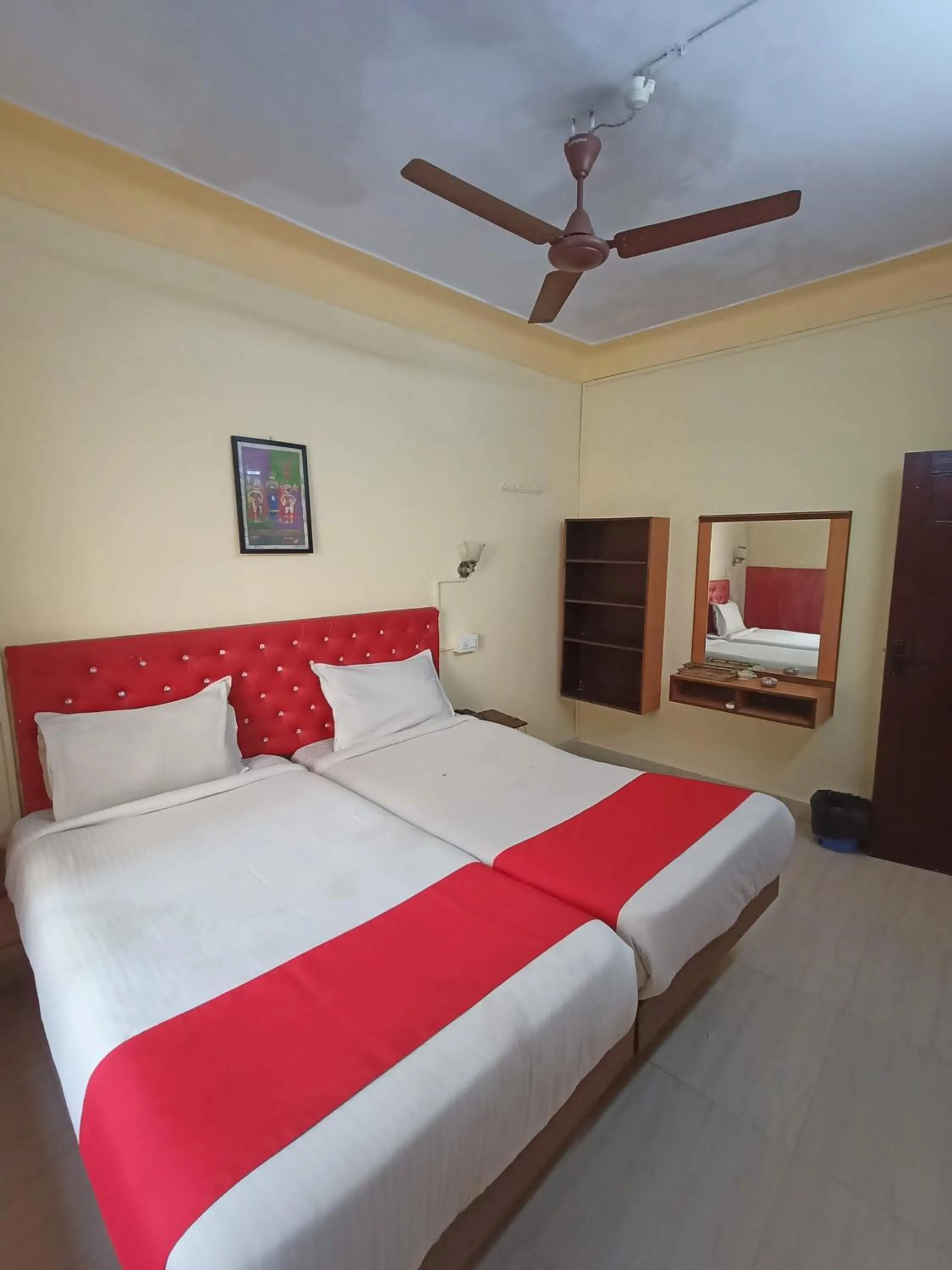 Bed in Sanman Hotels