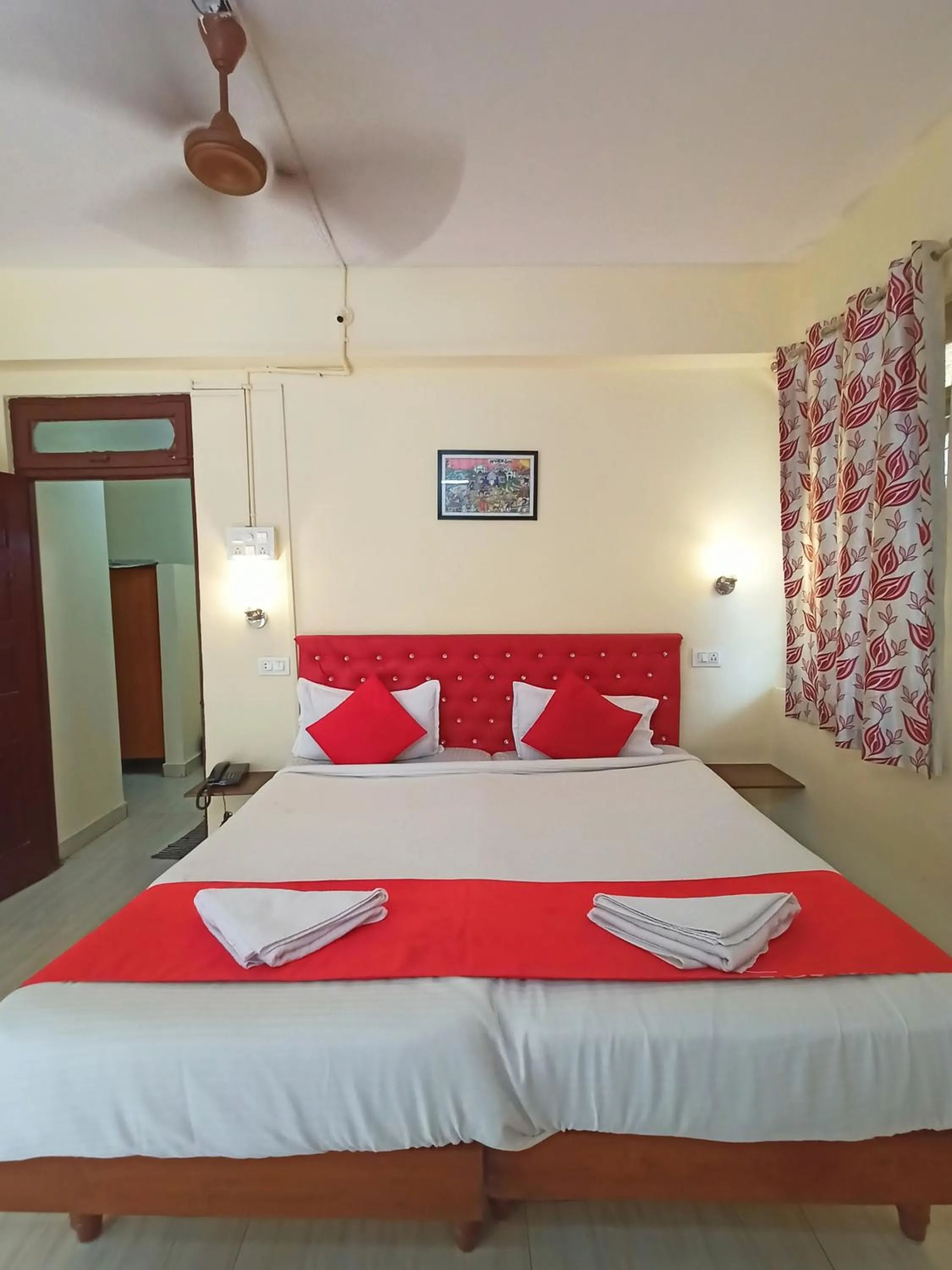 Bed in Sanman Hotels