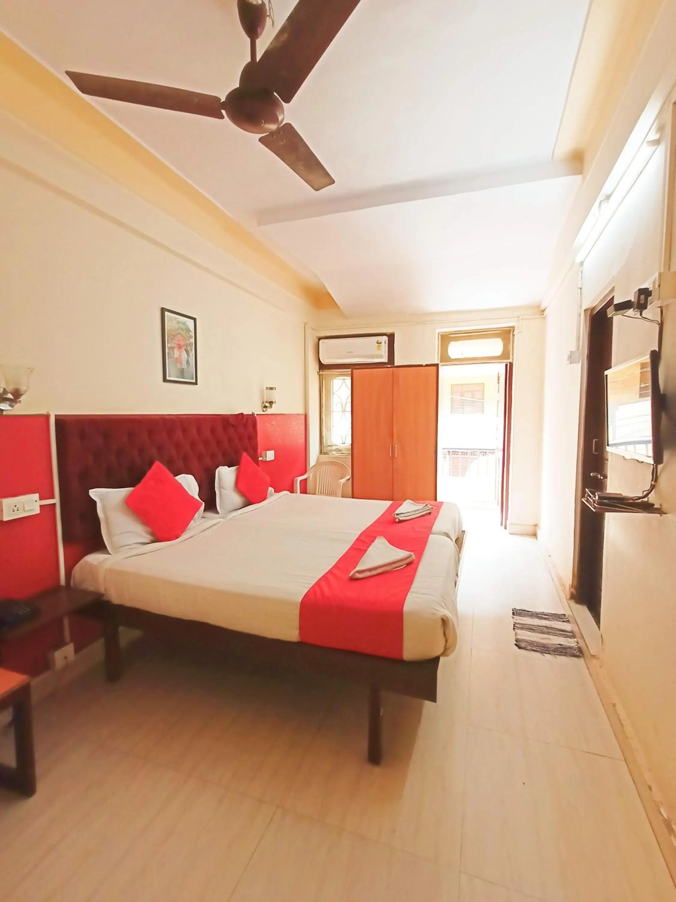 Bed in Sanman Hotels