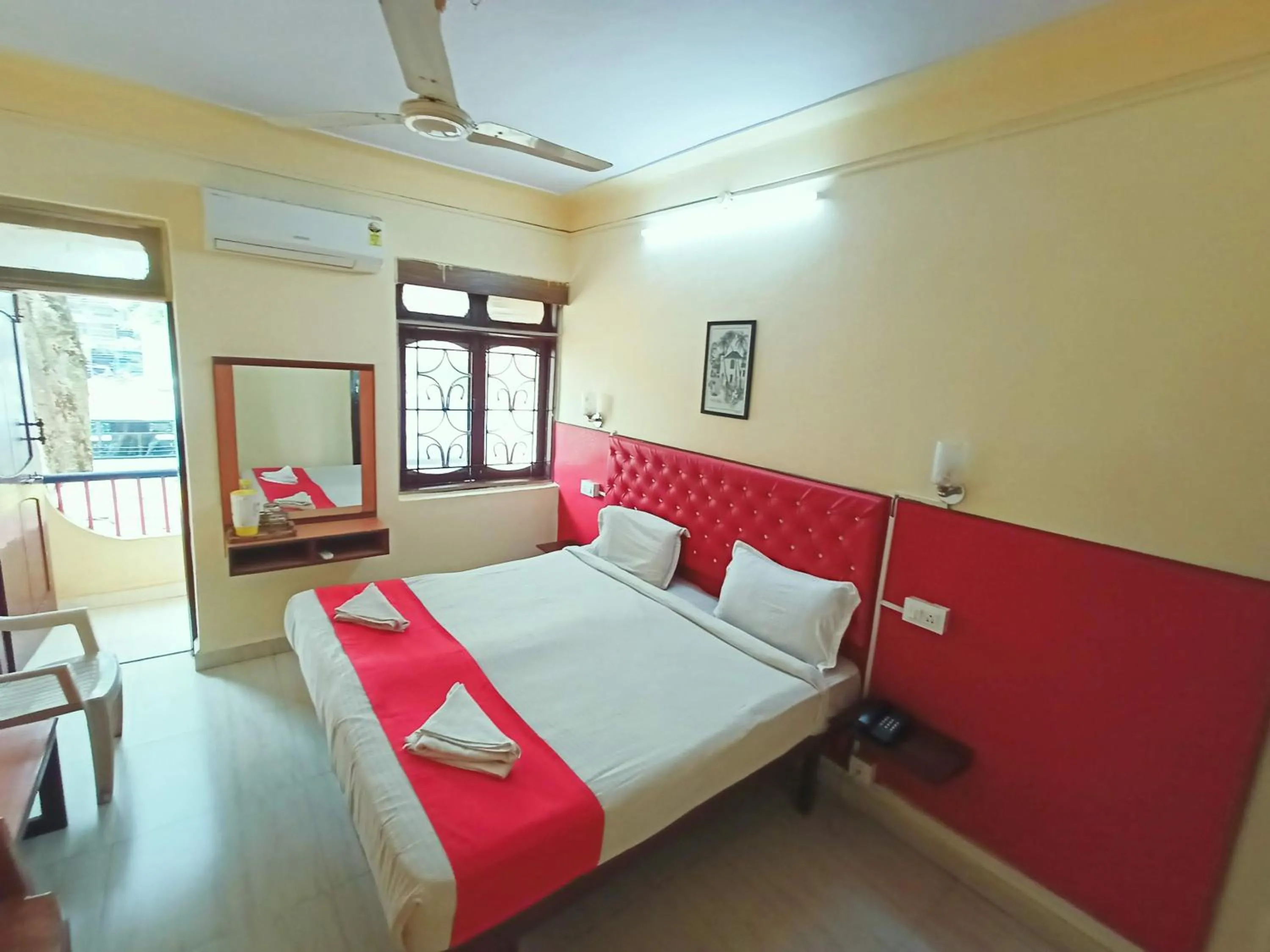 Bed in Sanman Hotels