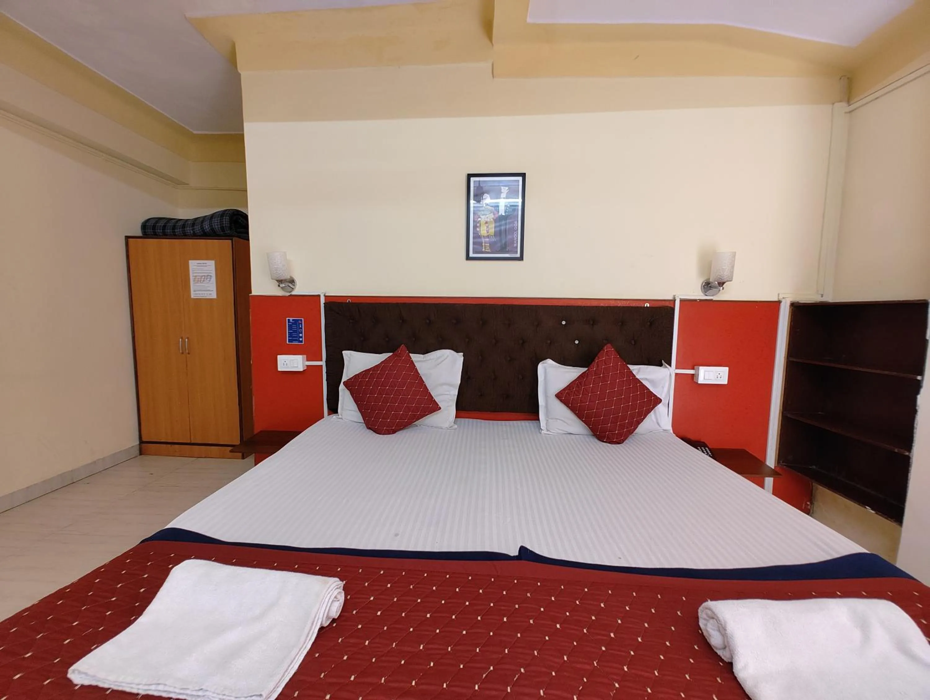 Bed in Sanman Hotels