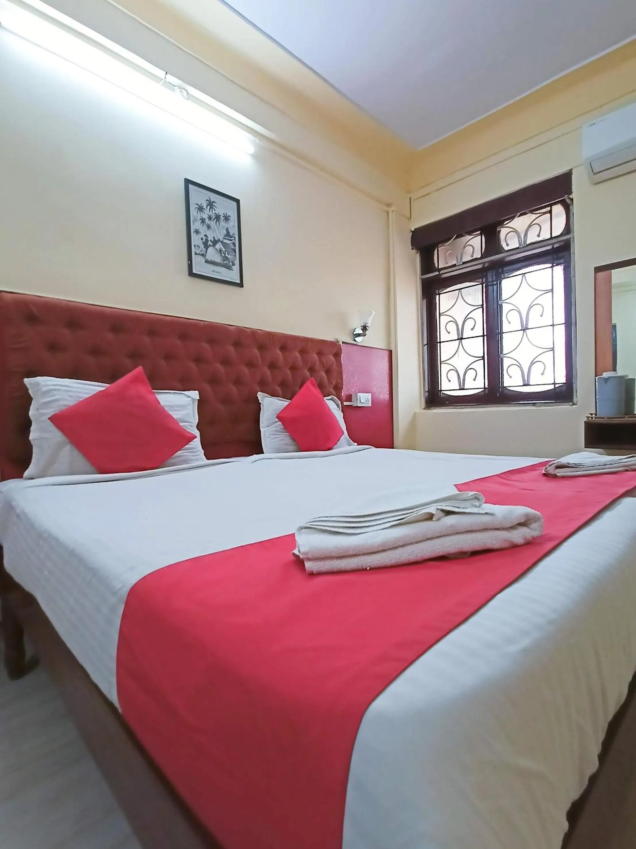 Bed in Sanman Hotels