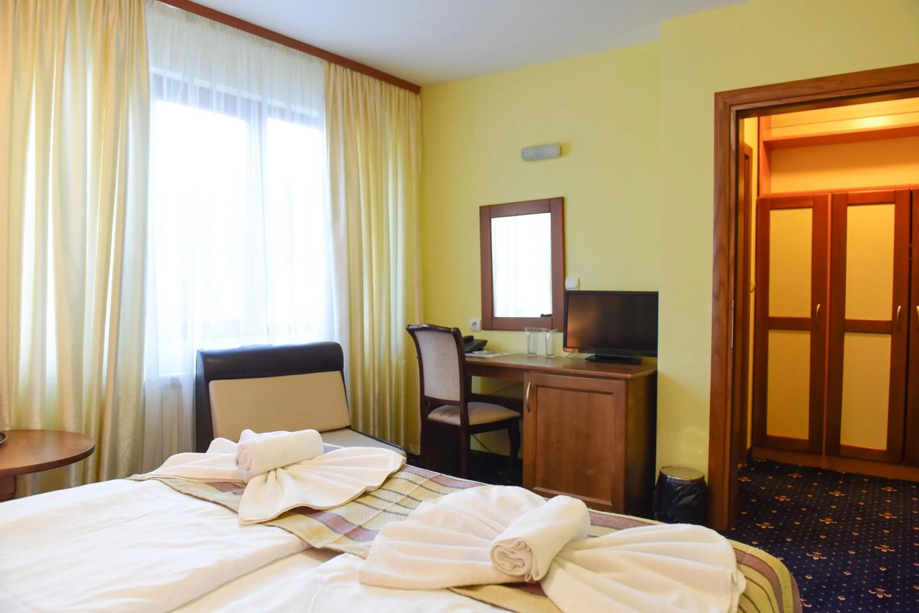 Bed in Family Hotel Lazur