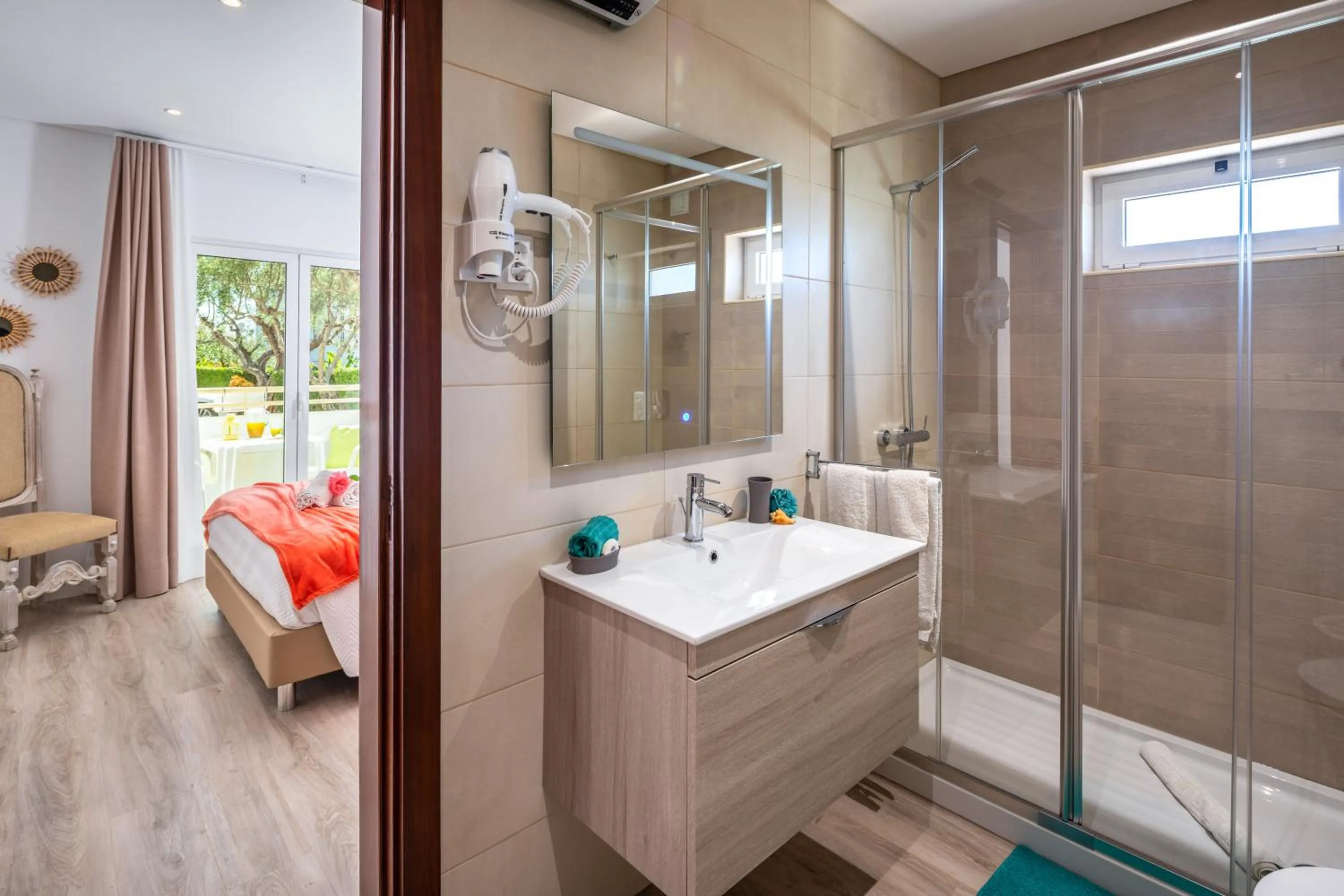 Shower, Bed in Apartamentos Flor da Laranja, Albufeira by AlgarveBlossom