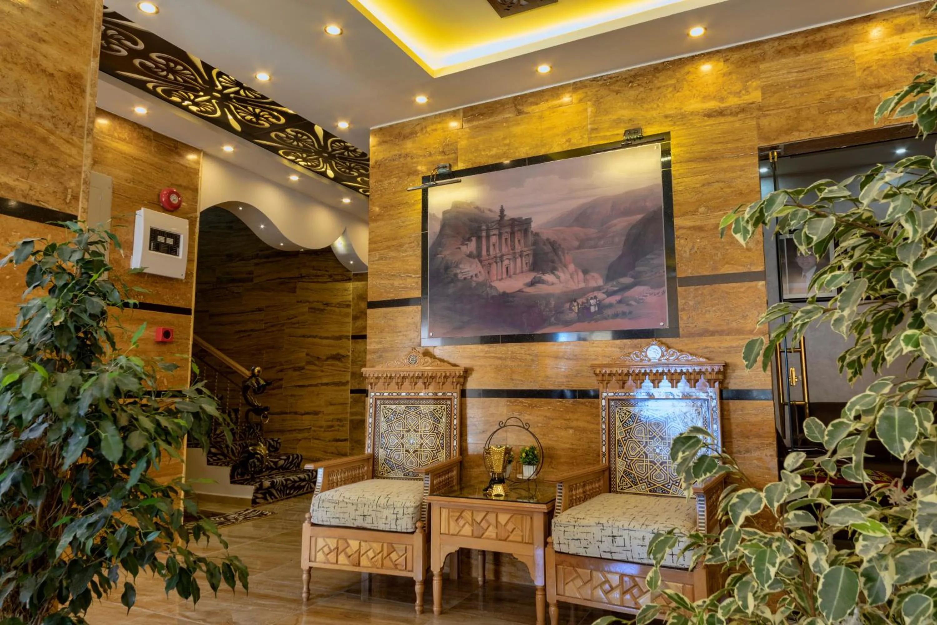 Communal lounge/ TV room in Town Season Hotel