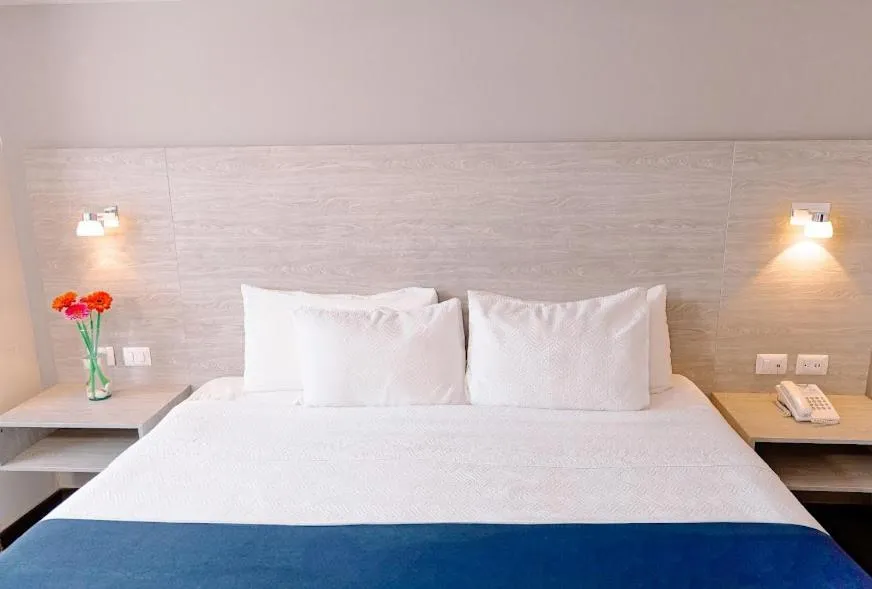 Bed in Kasa Hotel & Suites