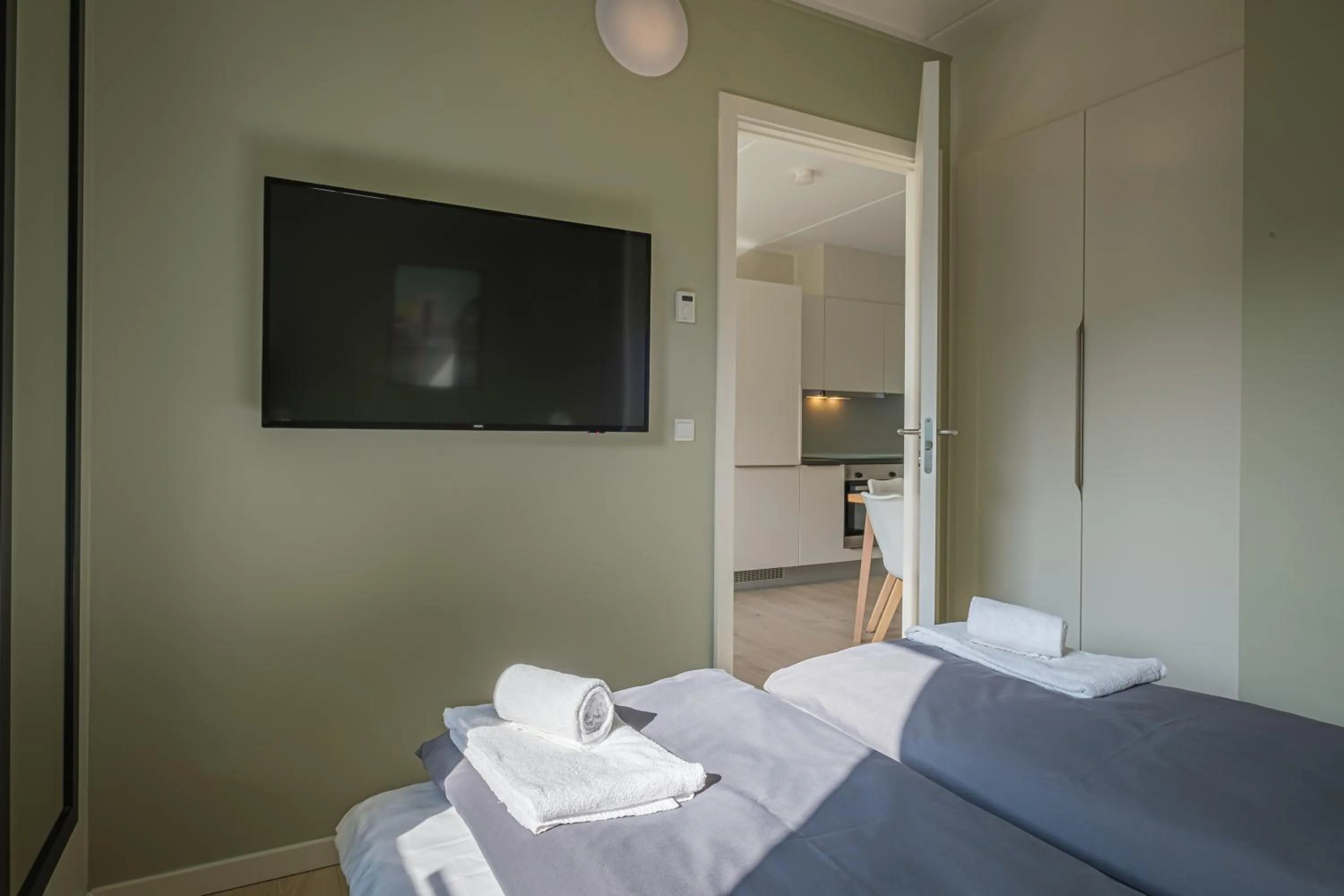 Bed in Aalborg Hotel Apartments